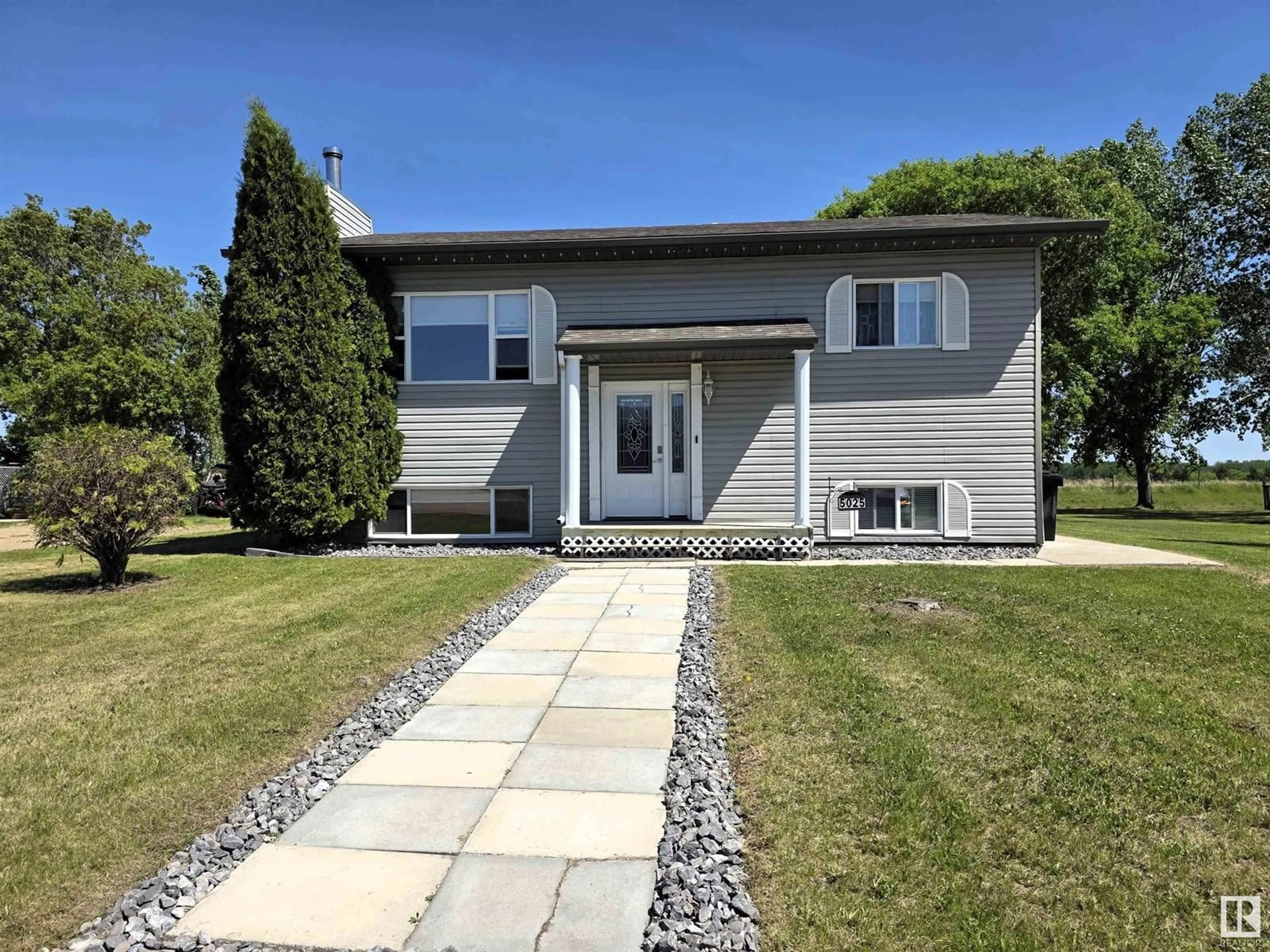 Home with vinyl exterior material, street for 5025 49 STREET, Fort Kent Alberta T9N1H0