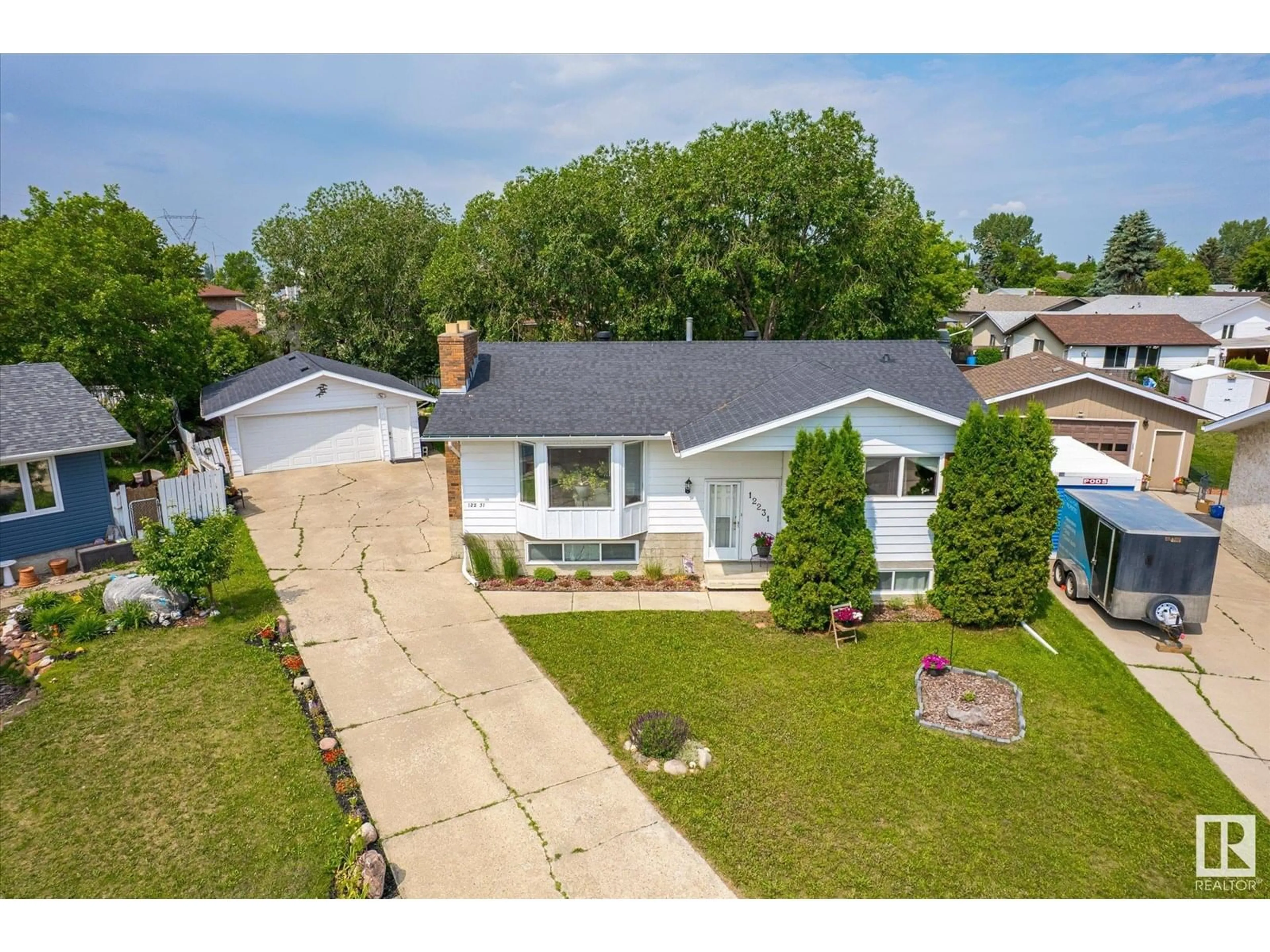 A pic from outside/outdoor area/front of a property/back of a property/a pic from drone, street for 12231 152A AV, Edmonton Alberta T5X1P9