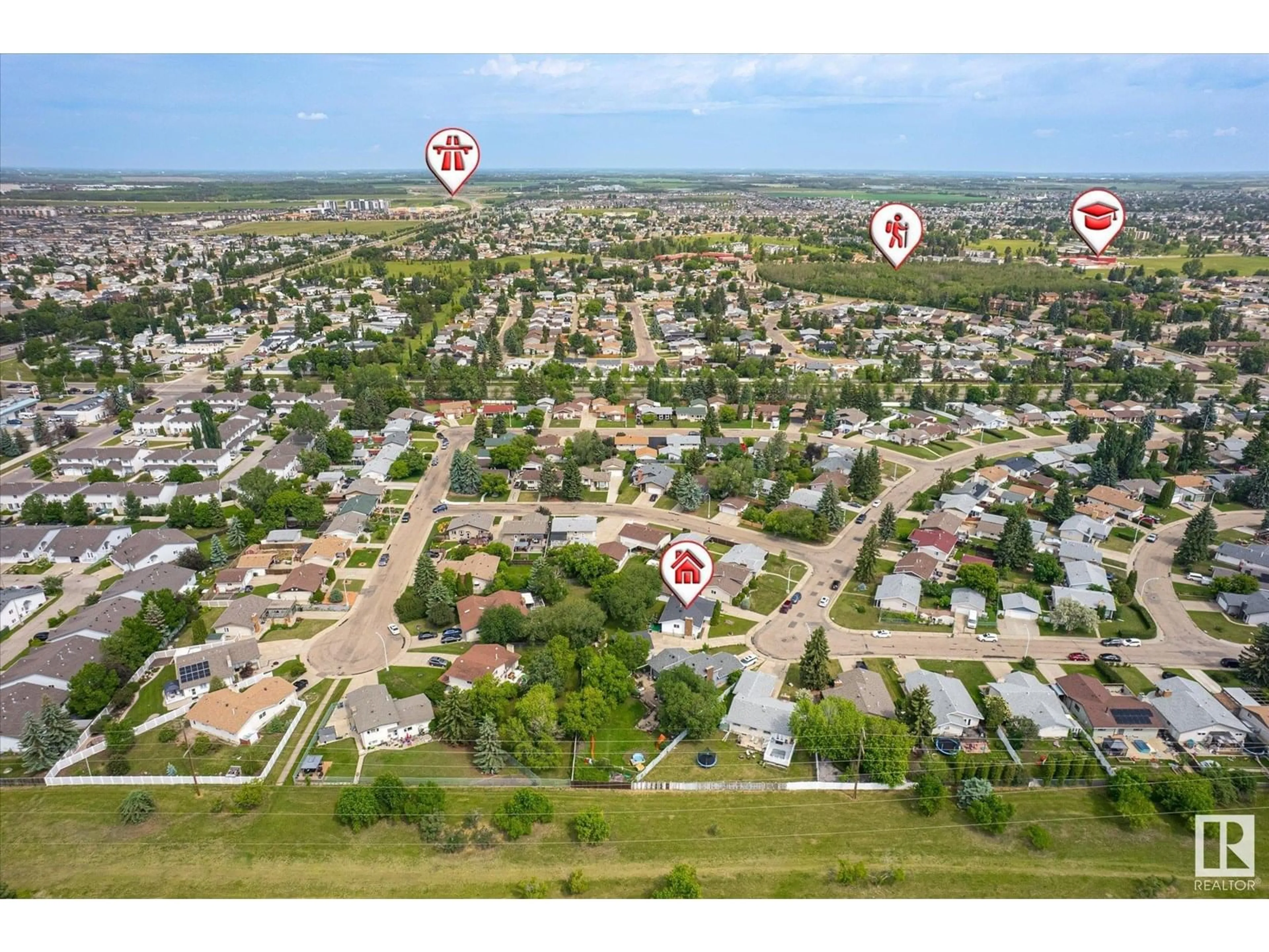 A pic from outside/outdoor area/front of a property/back of a property/a pic from drone, street for 12231 152A AV, Edmonton Alberta T5X1P9