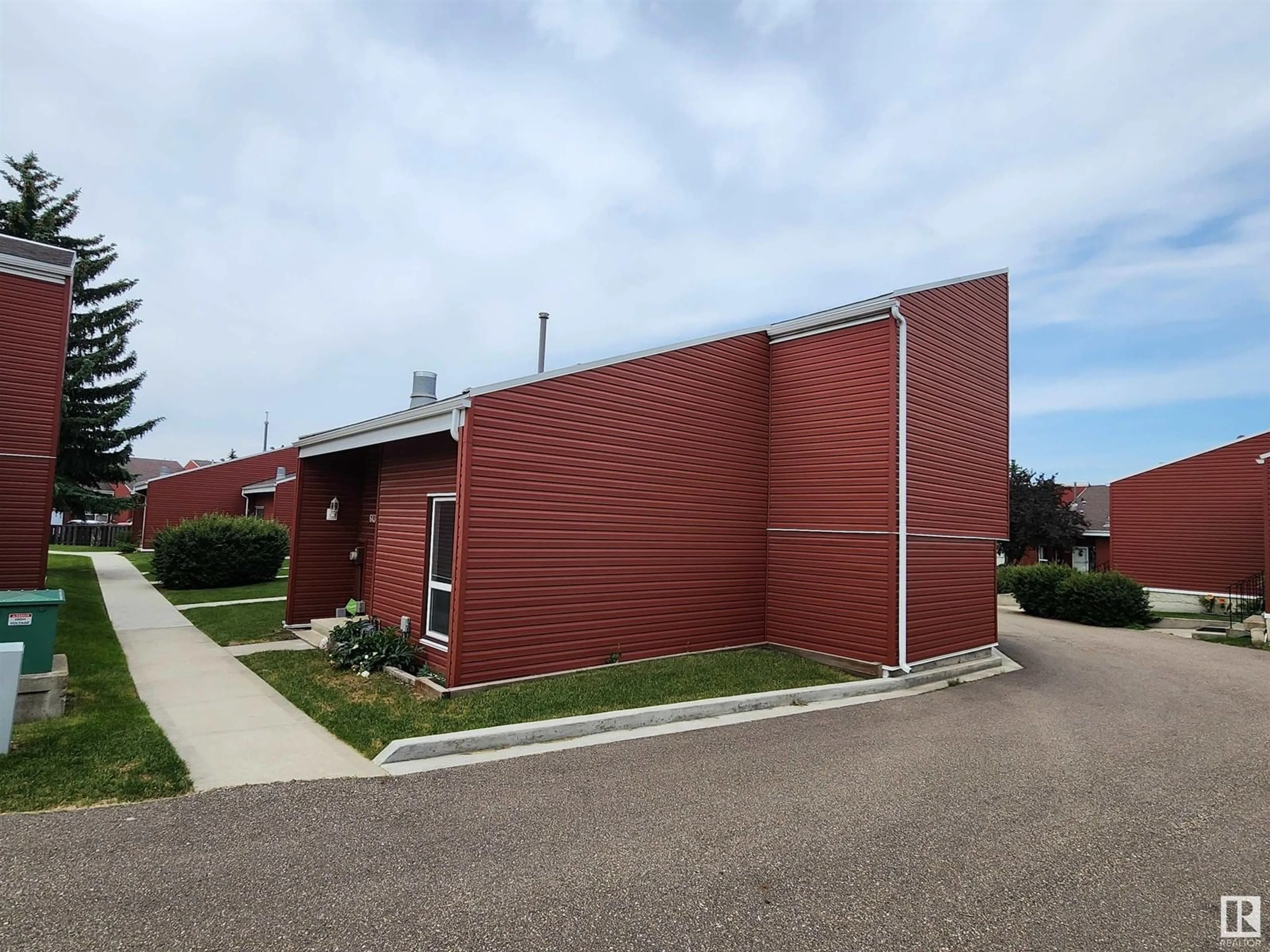 Home with brick exterior material, building for 613 MILLBOURNE RD E NW, Edmonton Alberta T6X3N3