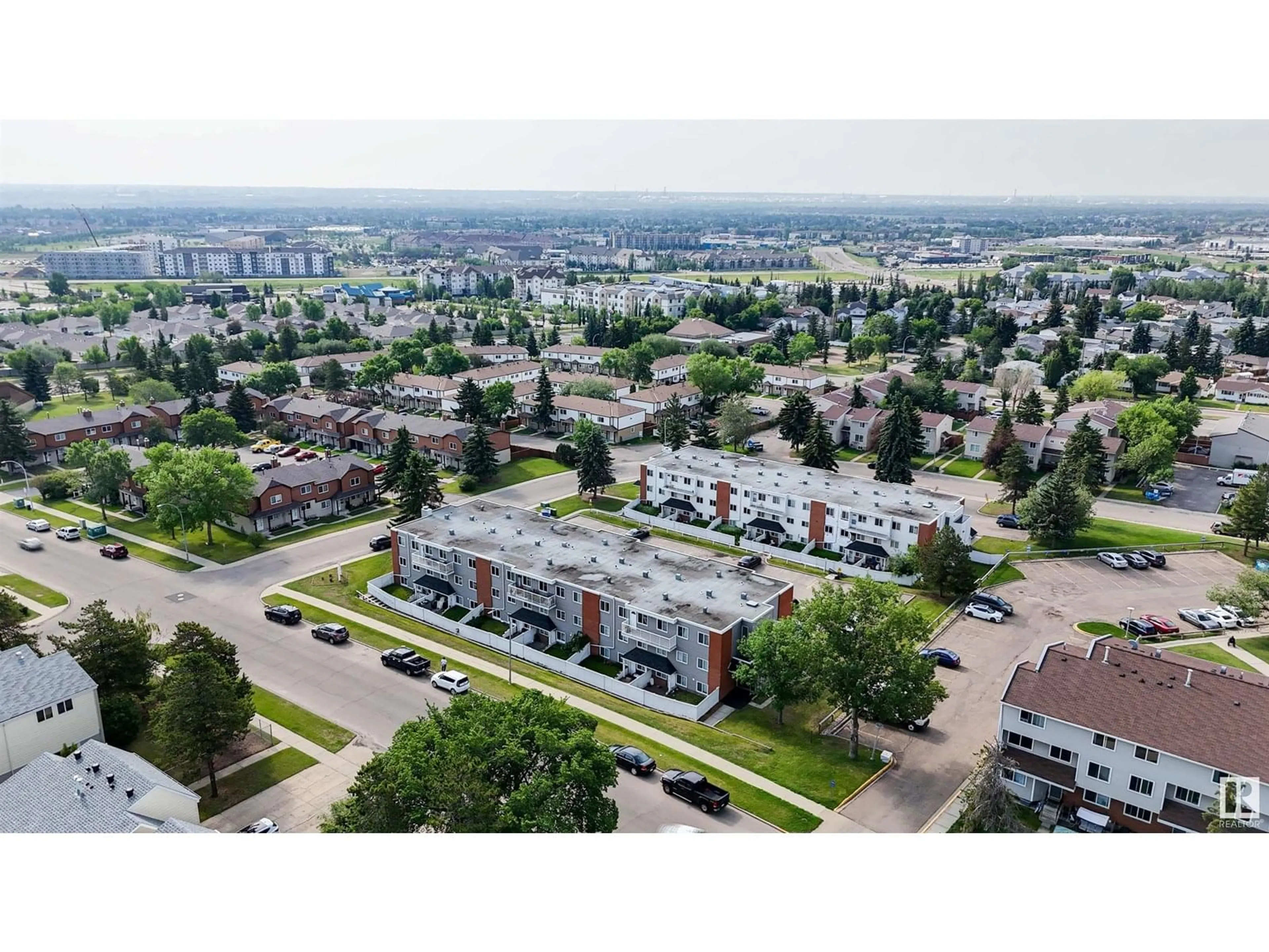 A pic from outside/outdoor area/front of a property/back of a property/a pic from drone, city buildings view from balcony for #106 - 14530 52 ST, Edmonton Alberta T5A3K5