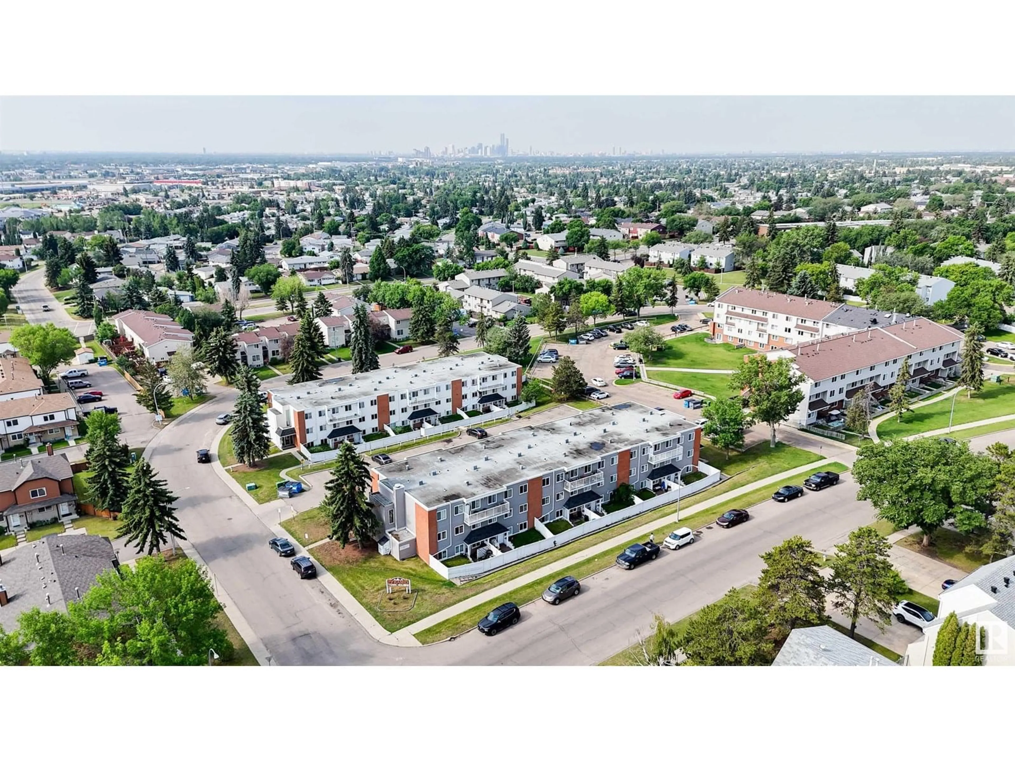 A pic from outside/outdoor area/front of a property/back of a property/a pic from drone, unknown for #106 - 14530 52 ST, Edmonton Alberta T5A3K5