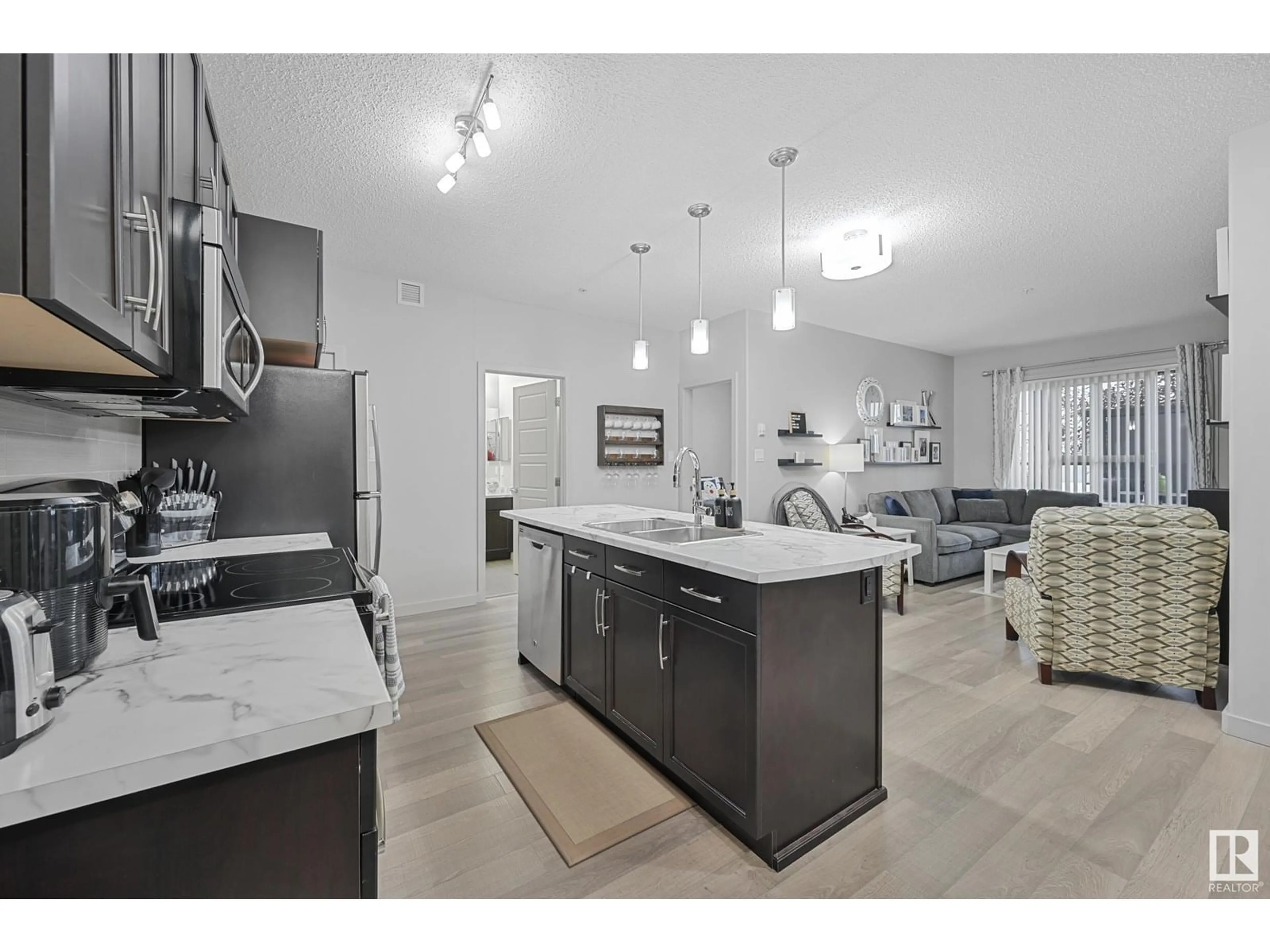 Open concept kitchen, unknown for #116 - 320 AMBLESIDE LINK, Edmonton Alberta T6W2Z9