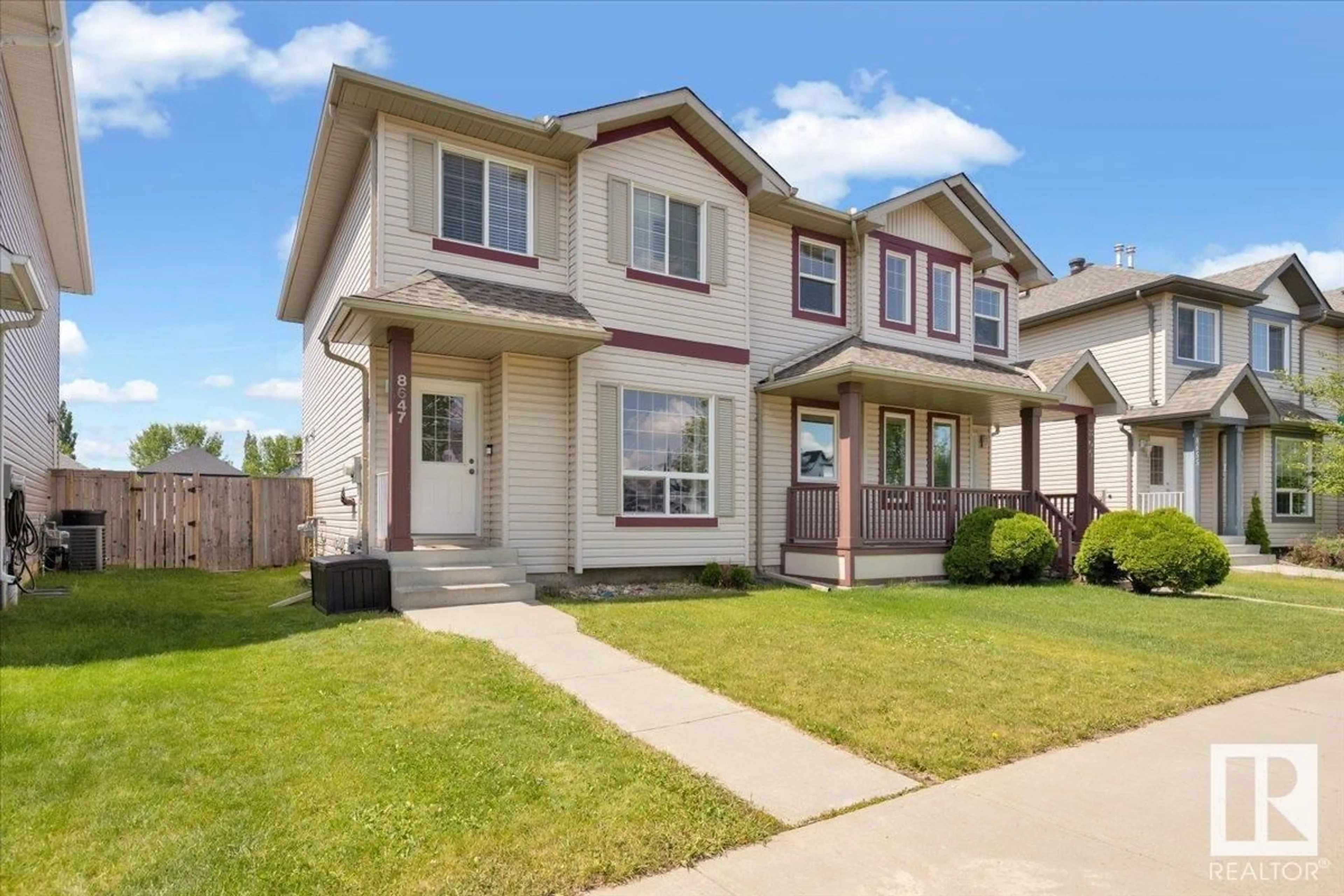 Home with vinyl exterior material, street for 8647 173 AV, Edmonton Alberta T5Z3W4