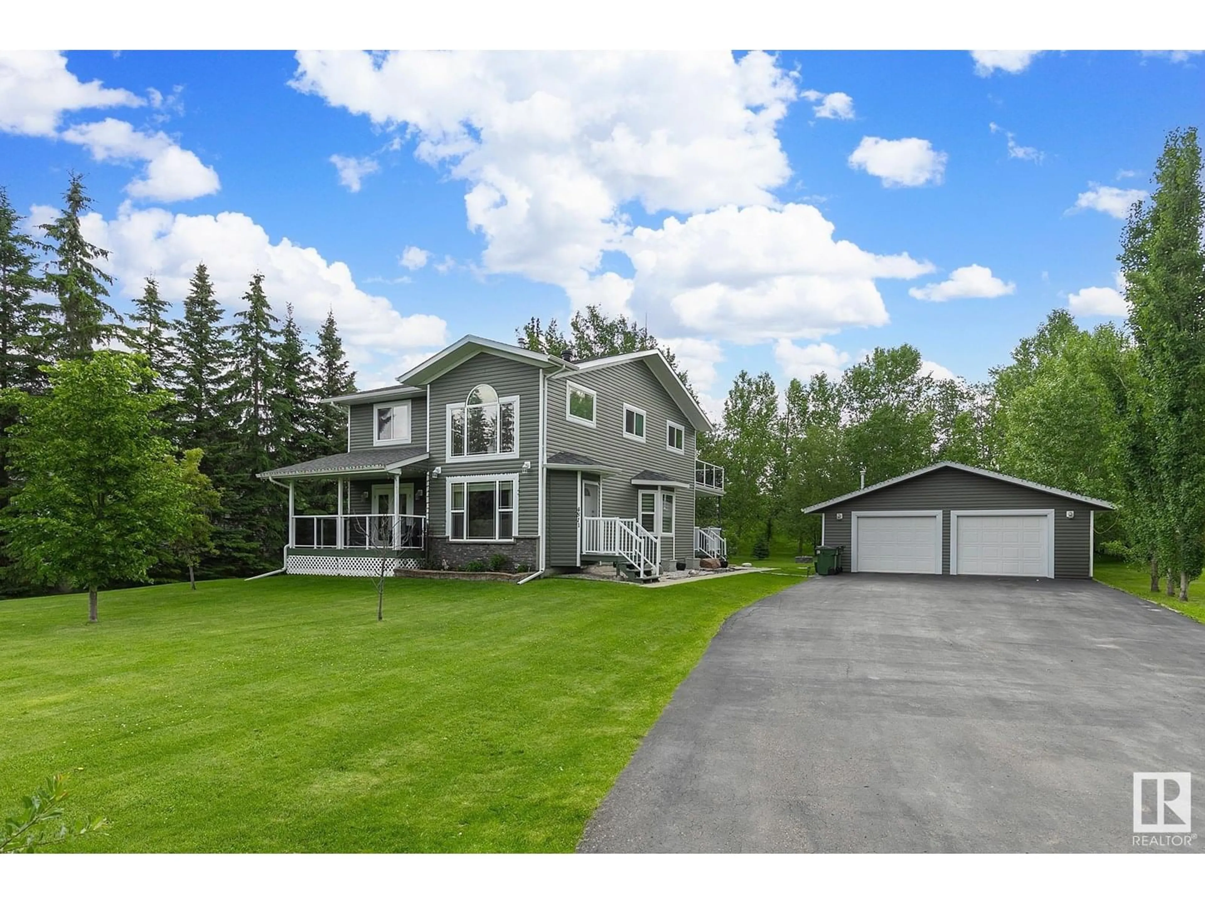 Home with vinyl exterior material, street for 4811 48 ST, Rural Lac Ste. Anne County Alberta T0E0A0
