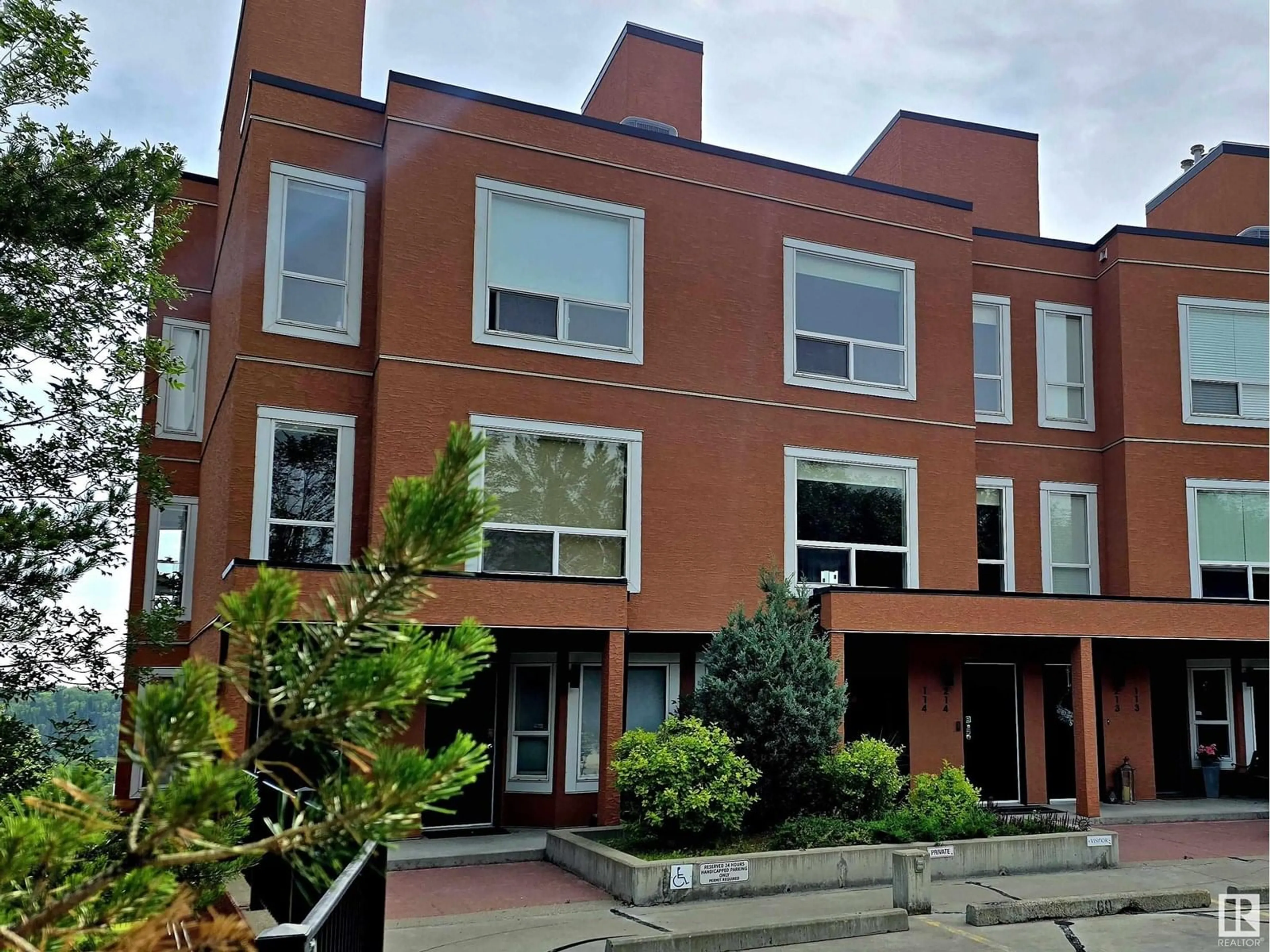 Home with brick exterior material, street for #214 - 10105 95 ST, Edmonton Alberta T5H4M4