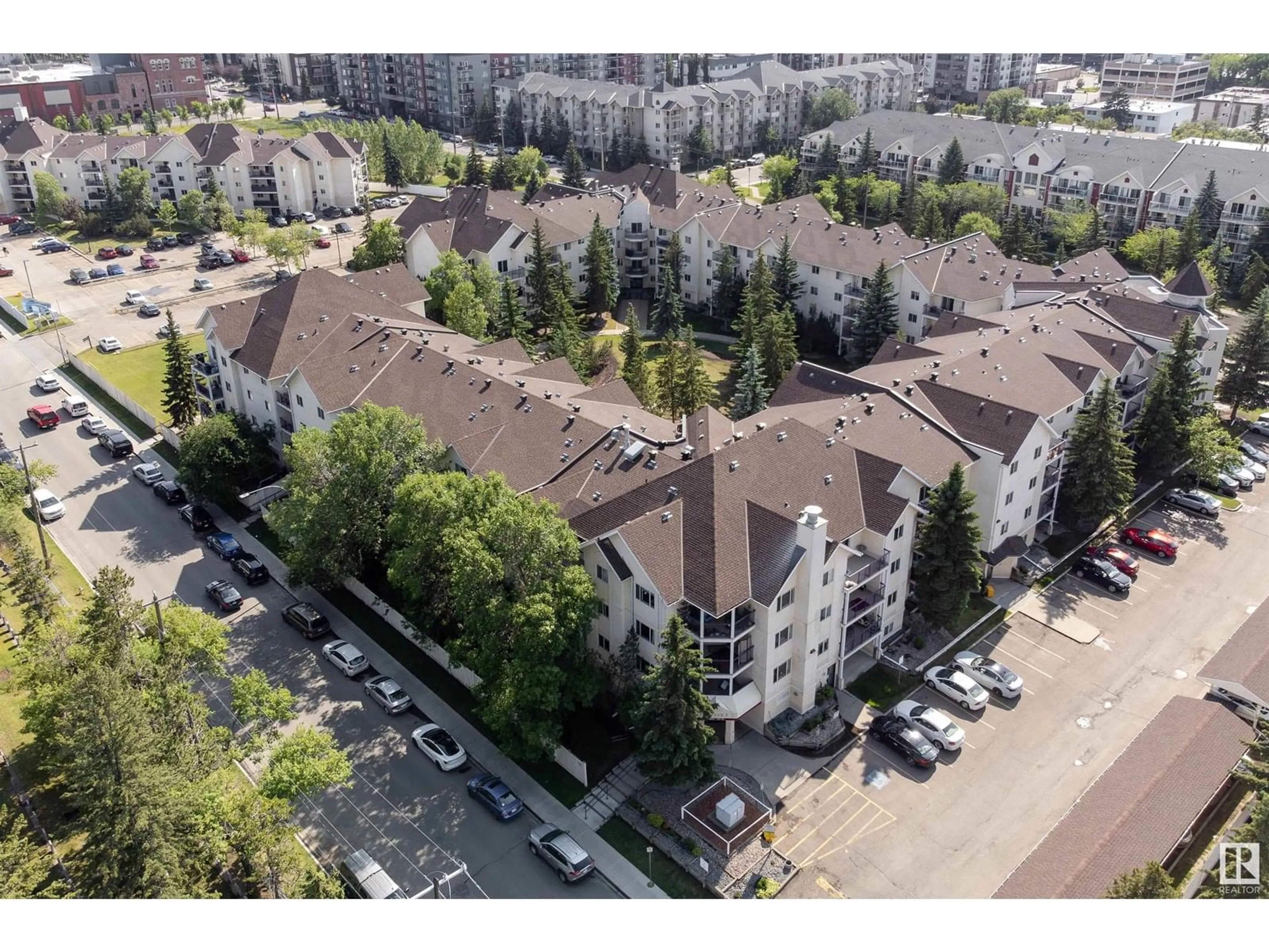 A pic from outside/outdoor area/front of a property/back of a property/a pic from drone, city buildings view from balcony for #105 - 10636 120 ST, Edmonton Alberta T5H4L5