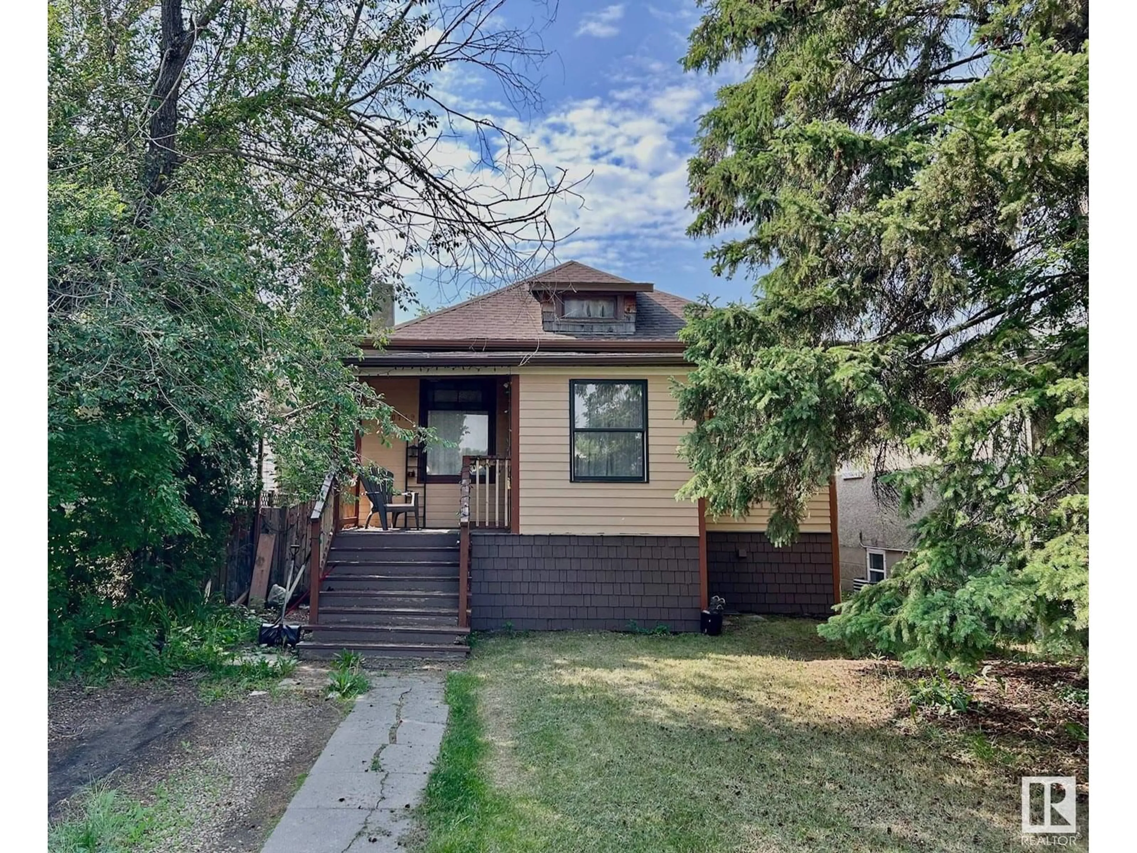 Home with brick exterior material, street for NW - 10719 74 AV, Edmonton Alberta T6E1G7