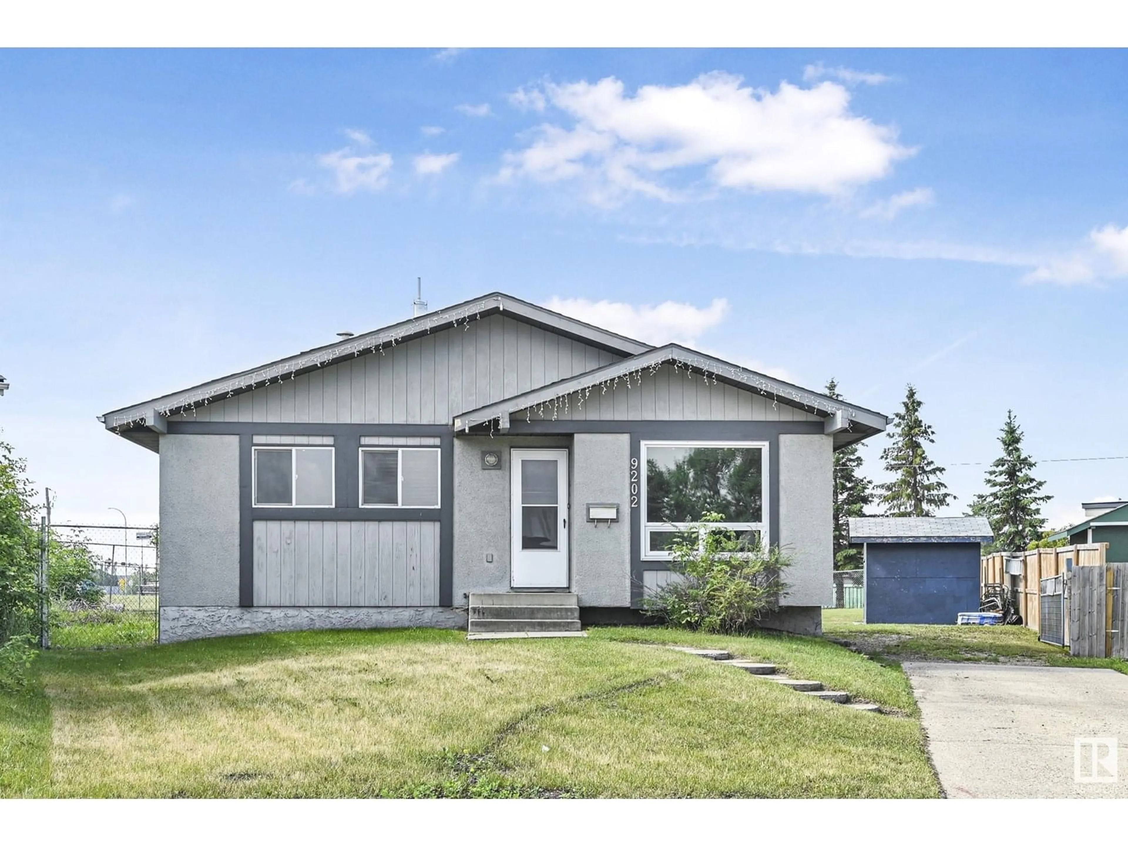 Home with vinyl exterior material, street for 9202 79 ST, Fort Saskatchewan Alberta T8L3L7