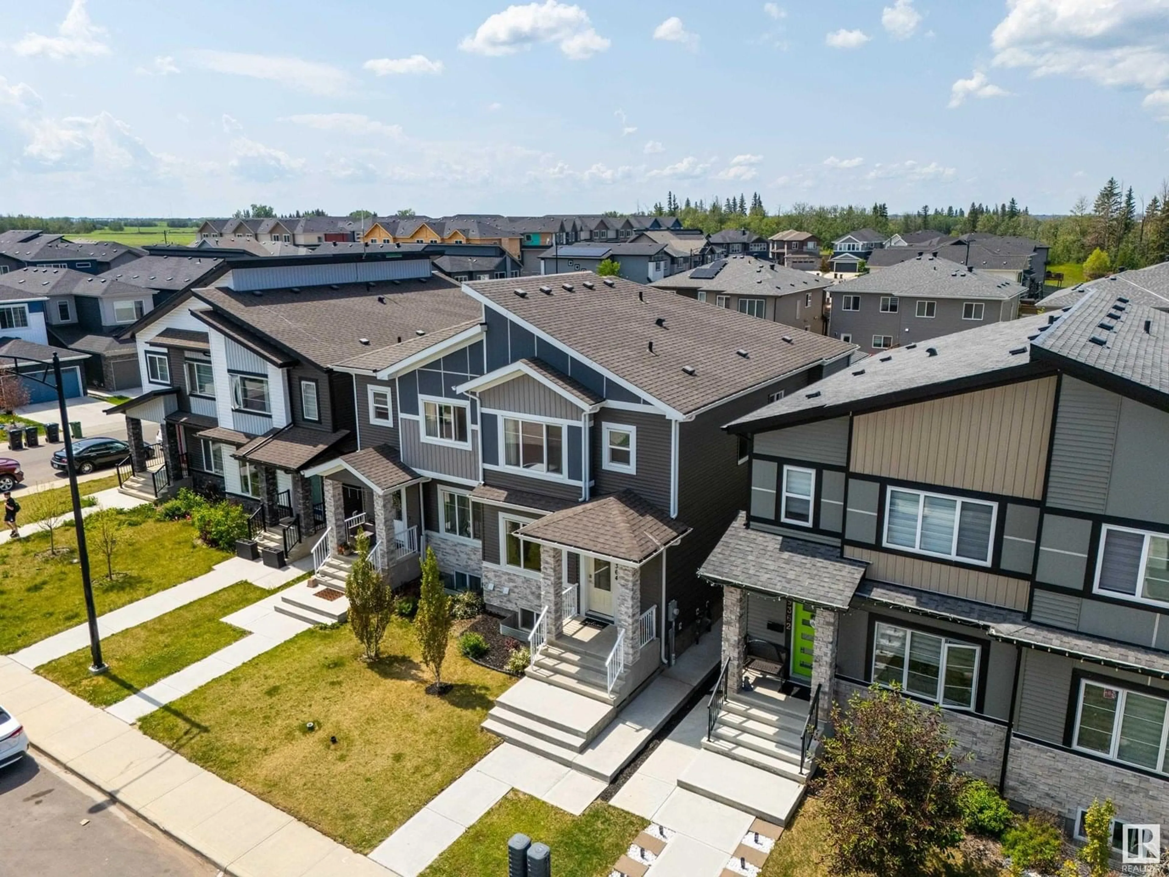 A pic from outside/outdoor area/front of a property/back of a property/a pic from drone, mountain view for SW - 9364 PEAR LINK LI, Edmonton Alberta T6X2X5