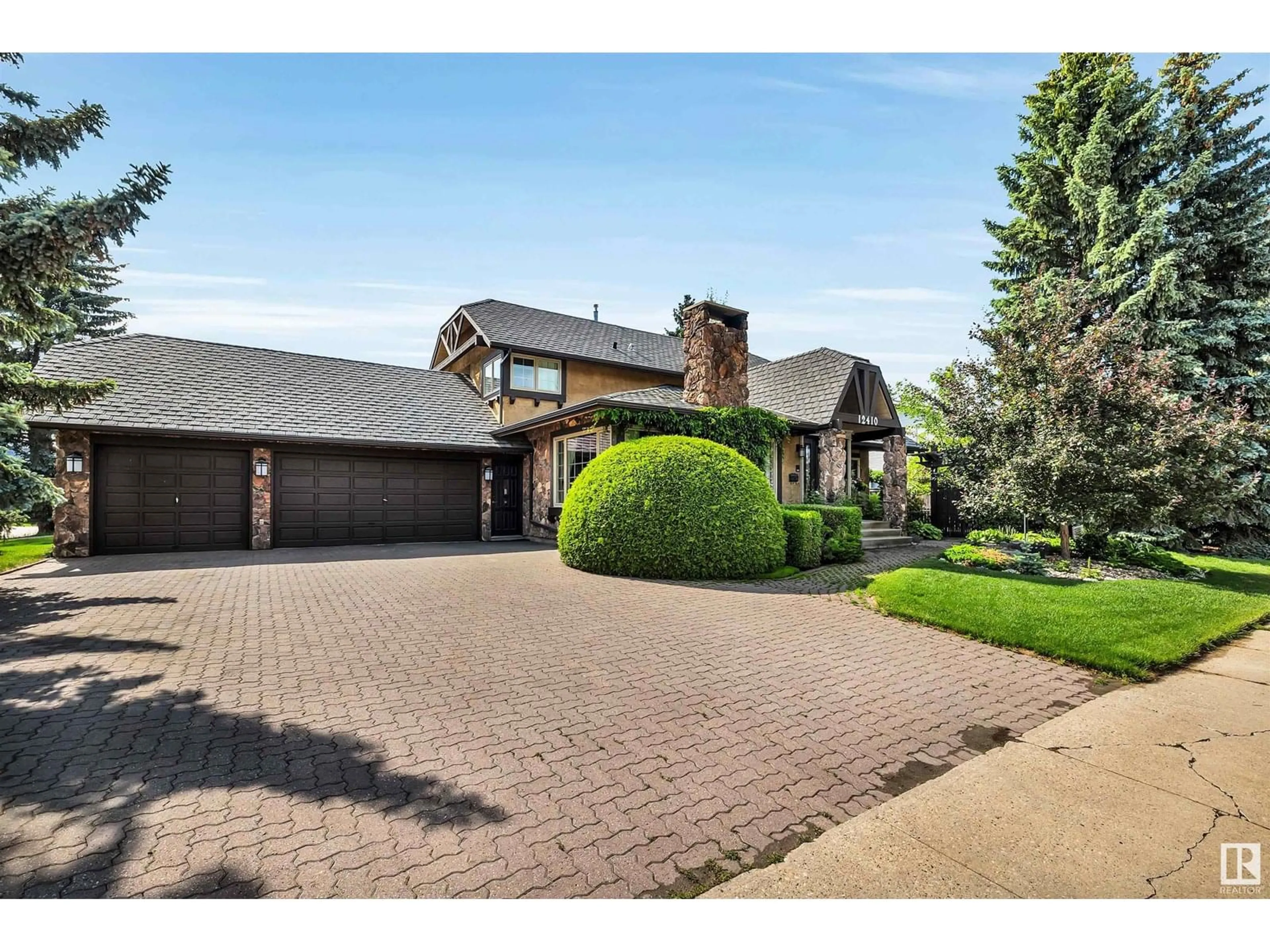Home with brick exterior material, street for 12410 28A AV, Edmonton Alberta T6J4E1