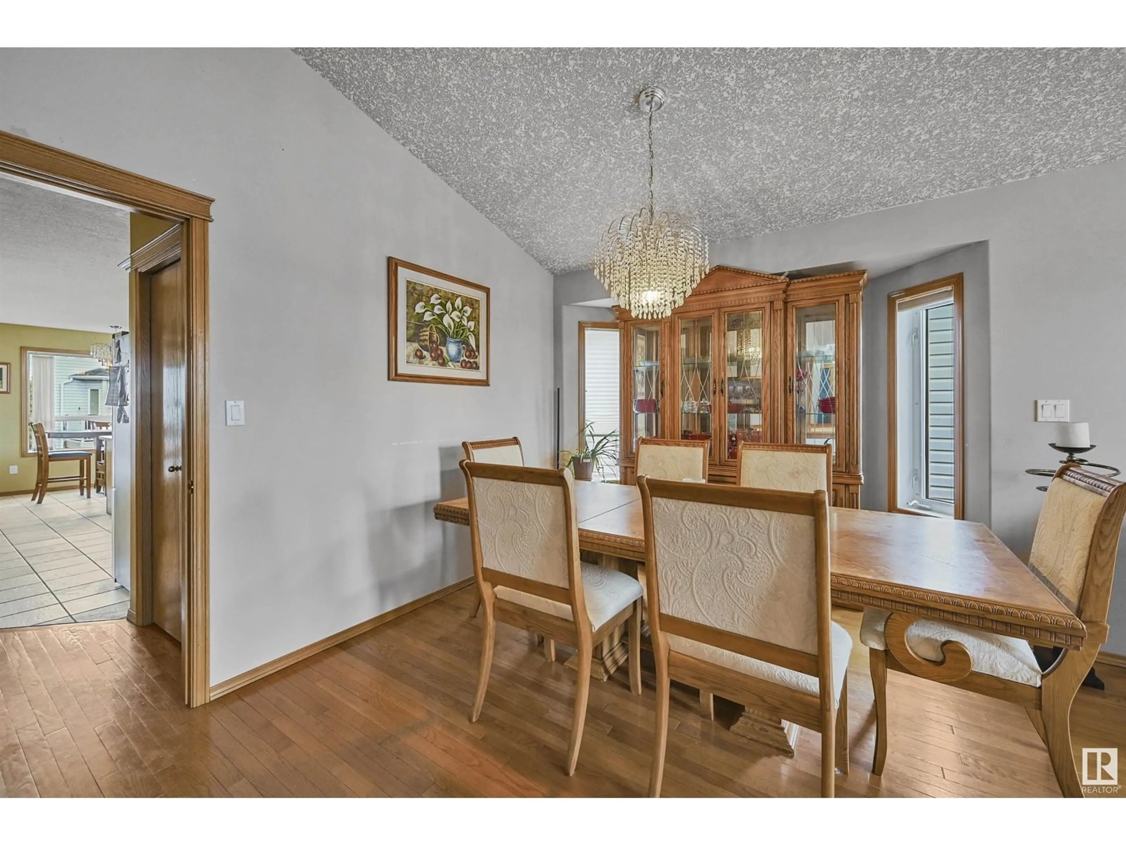 Dining room, wood/laminate floor for NW - 2832 36B AV, Edmonton Alberta T6T1N4