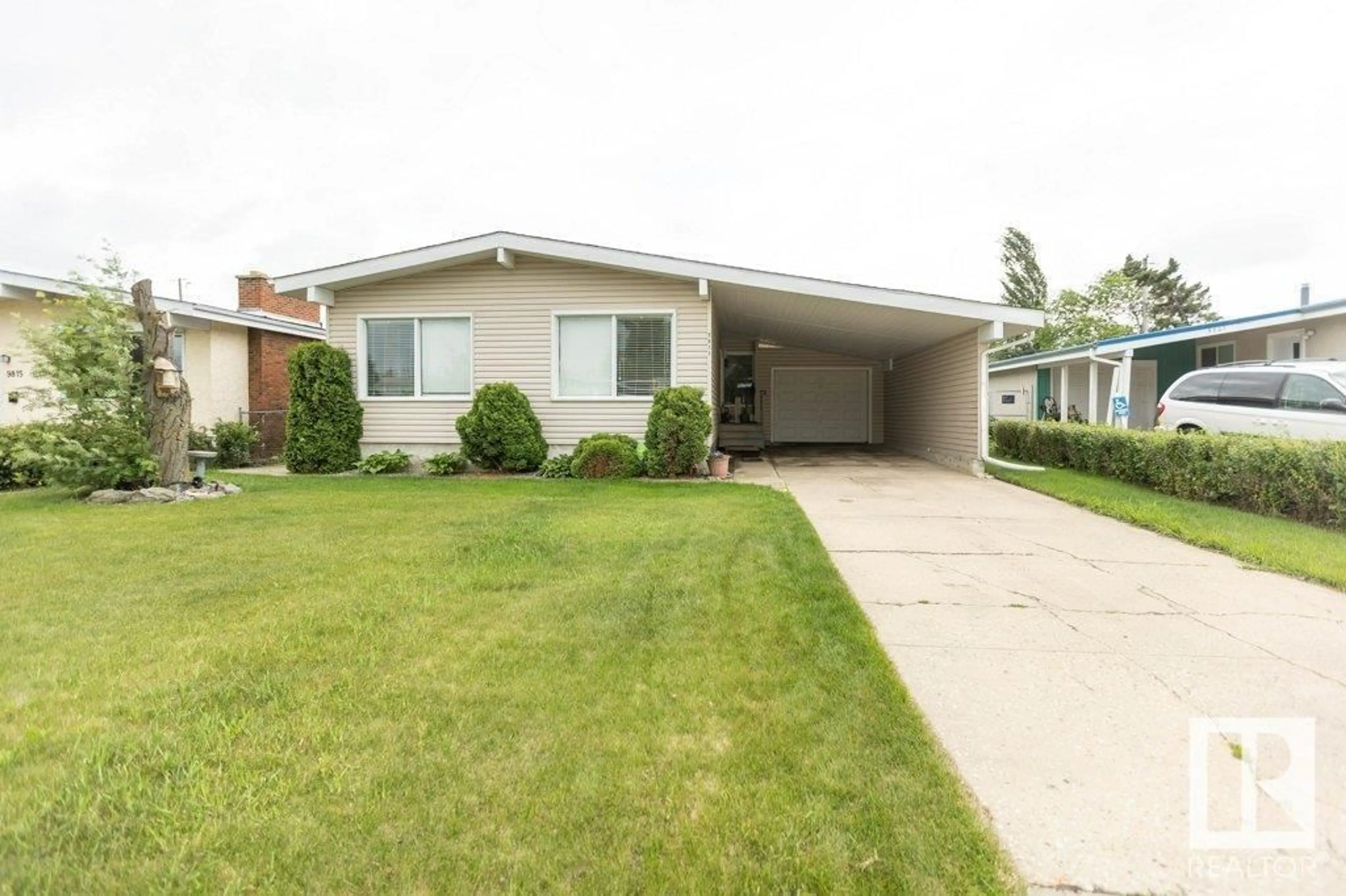 Home with vinyl exterior material, street for 9811 97 ST, Westlock Alberta T7P2A4