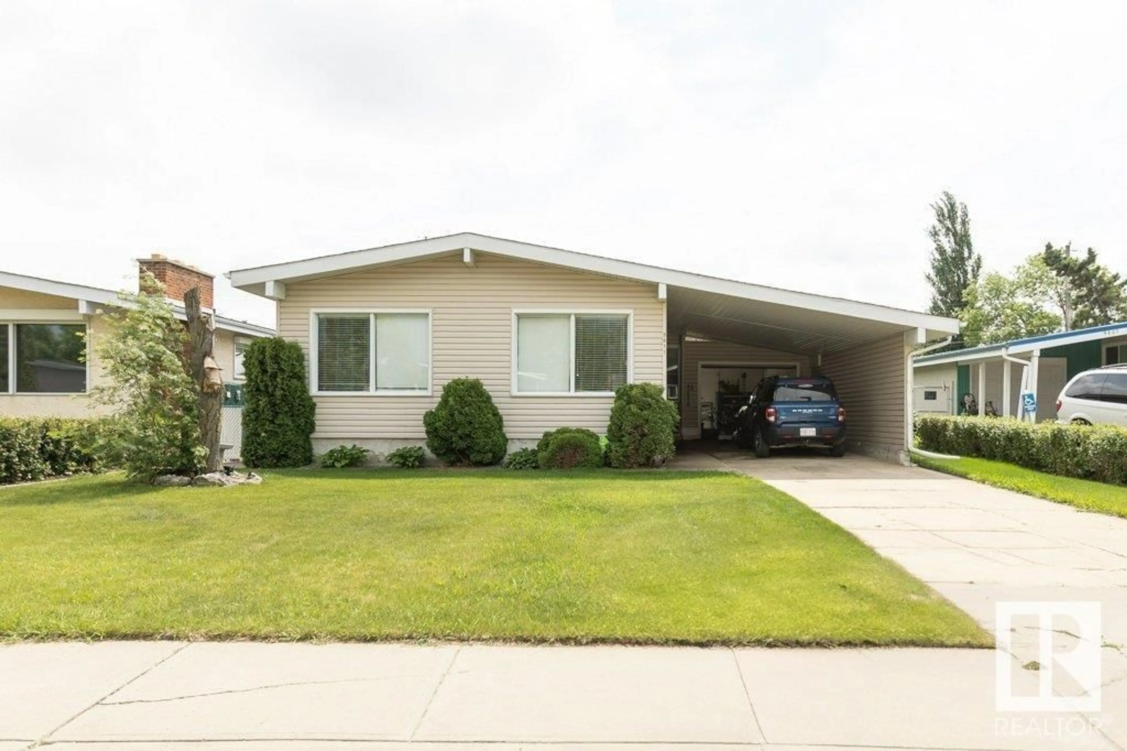 Home with vinyl exterior material, street for 9811 97 ST, Westlock Alberta T7P2A4