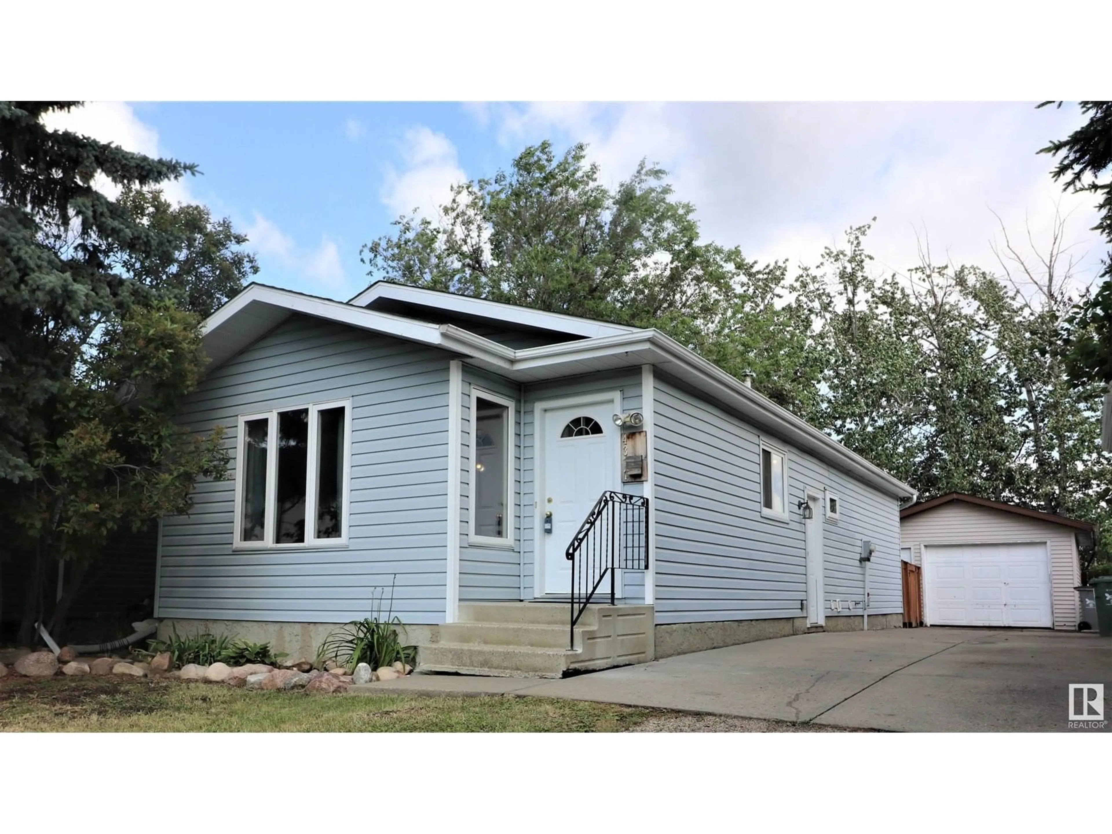 Home with vinyl exterior material, street for 4317 54 ST, Beaumont Alberta T4X1C6