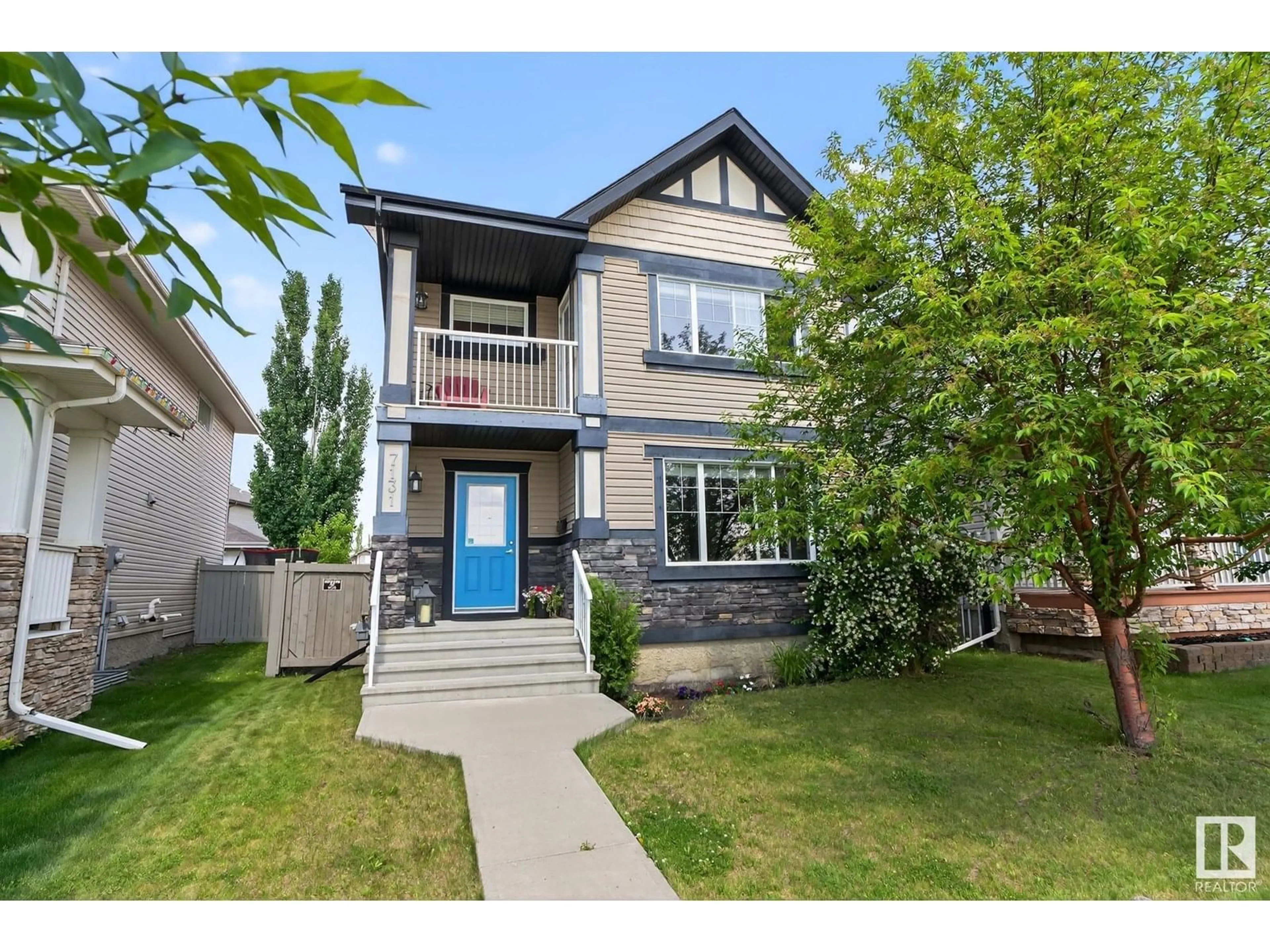 Home with vinyl exterior material, street for 7131 SOUTH TERWILLEGAR DR, Edmonton Alberta T6R0R5