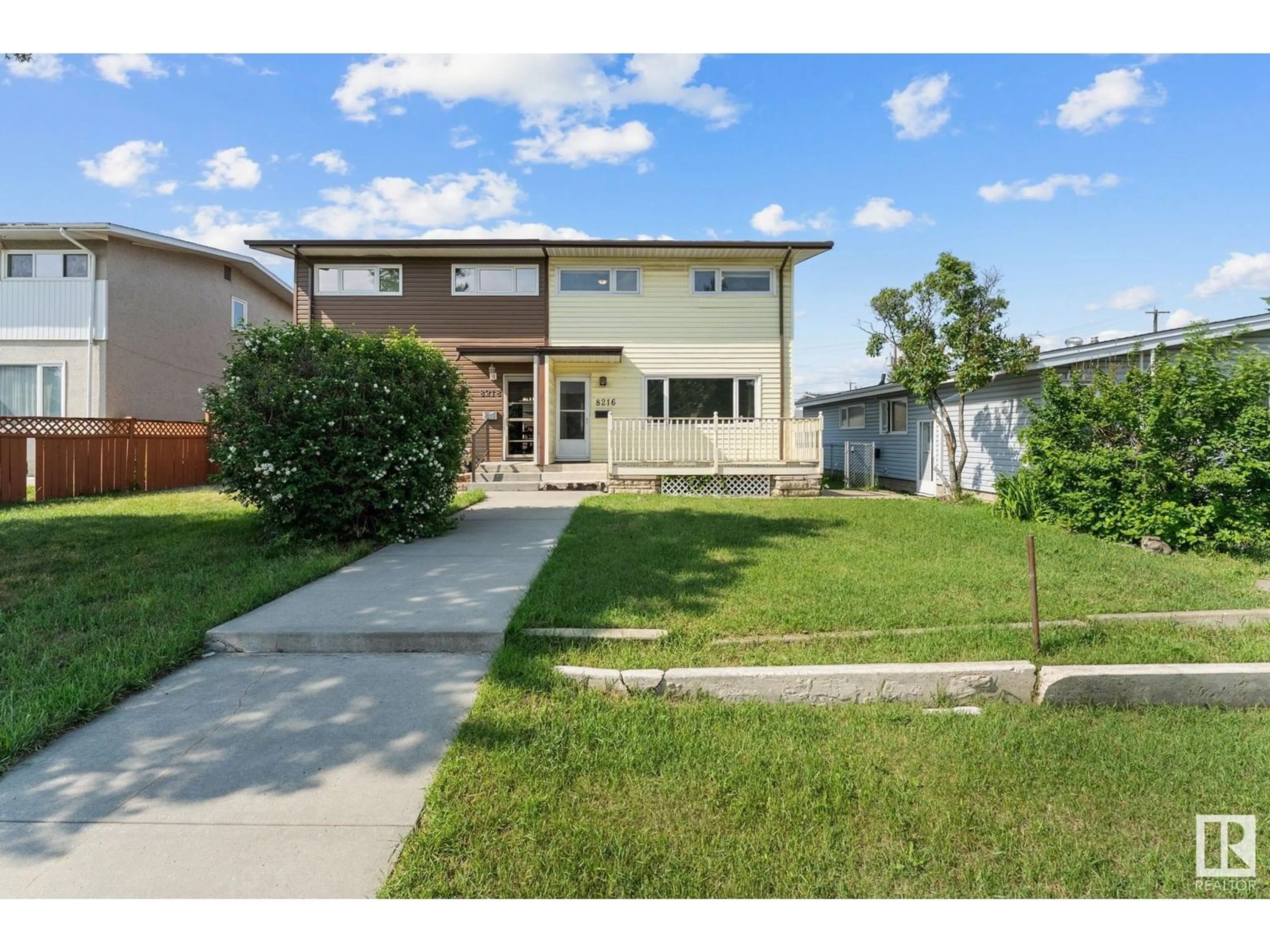 Home with vinyl exterior material, street for 8216 133A AV, Edmonton Alberta T5E1E9