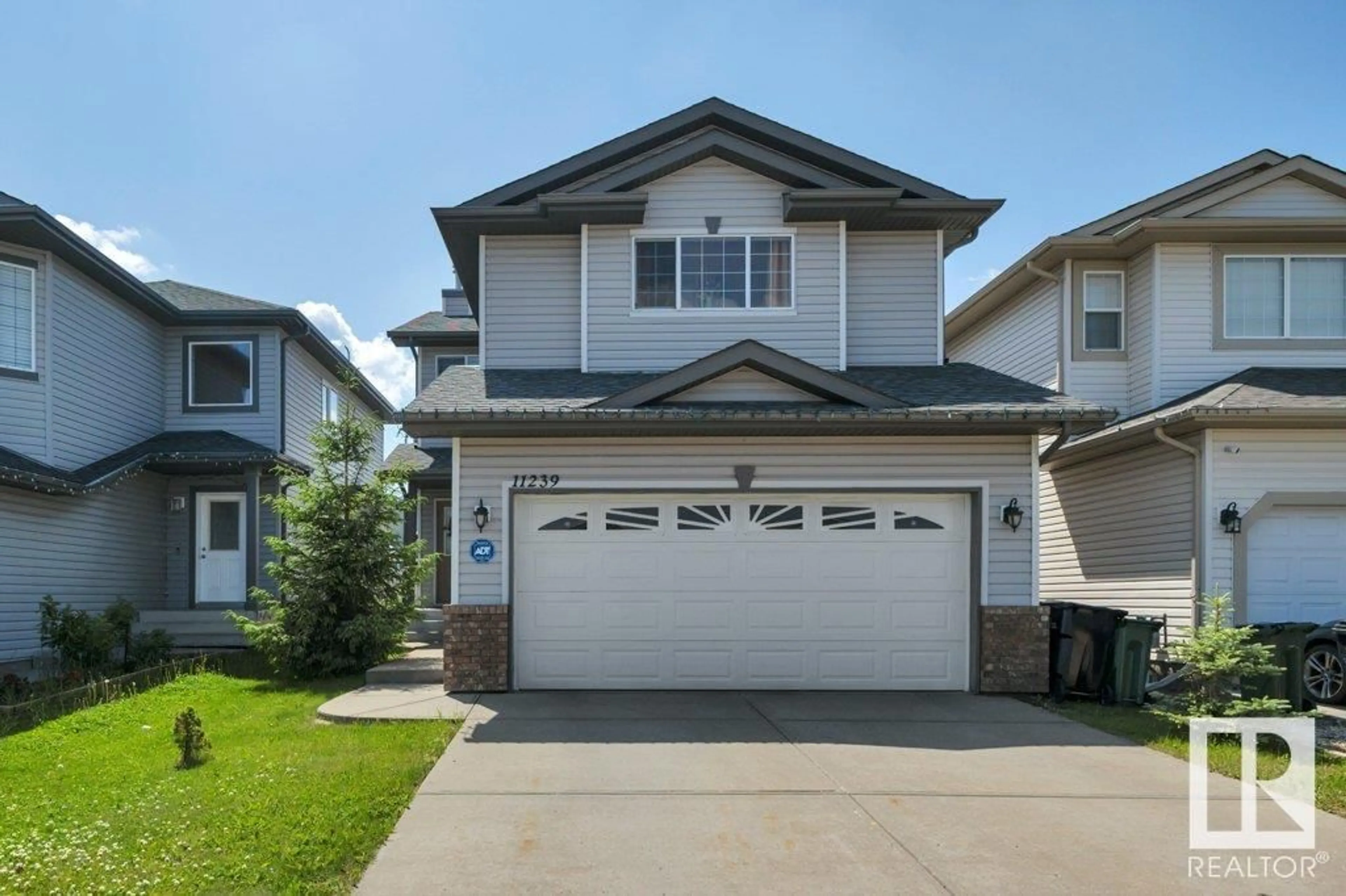Home with vinyl exterior material, street for NW - 11239 167B AV, Edmonton Alberta T5X6J6