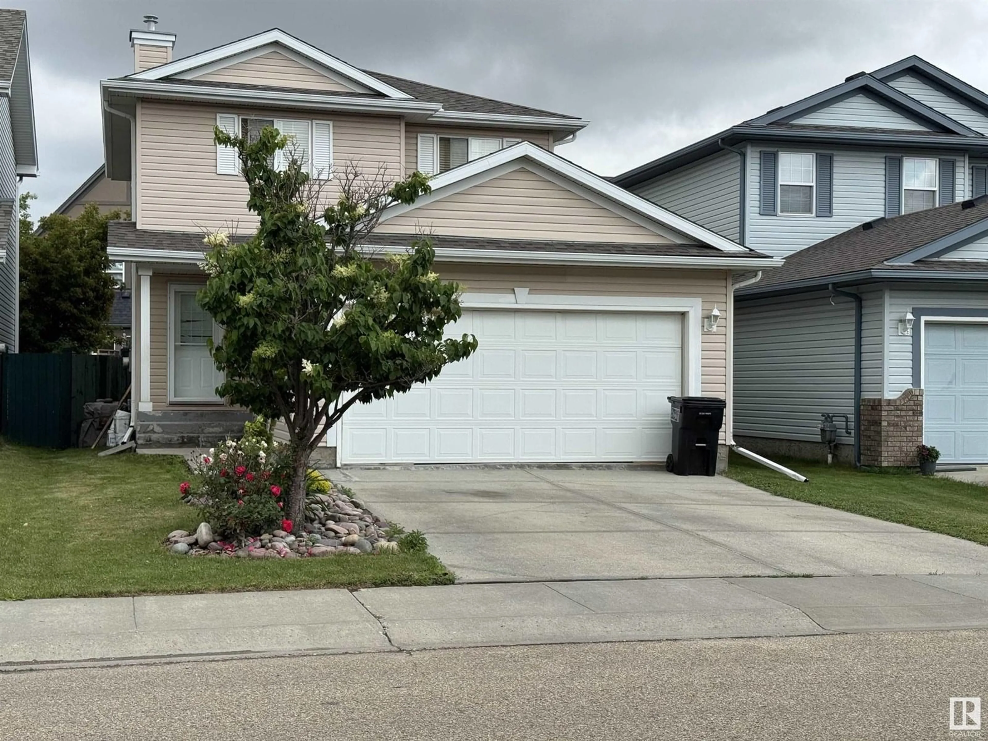 Home with vinyl exterior material, street for 1857 GARNETT WY, Edmonton Alberta T5T6R3