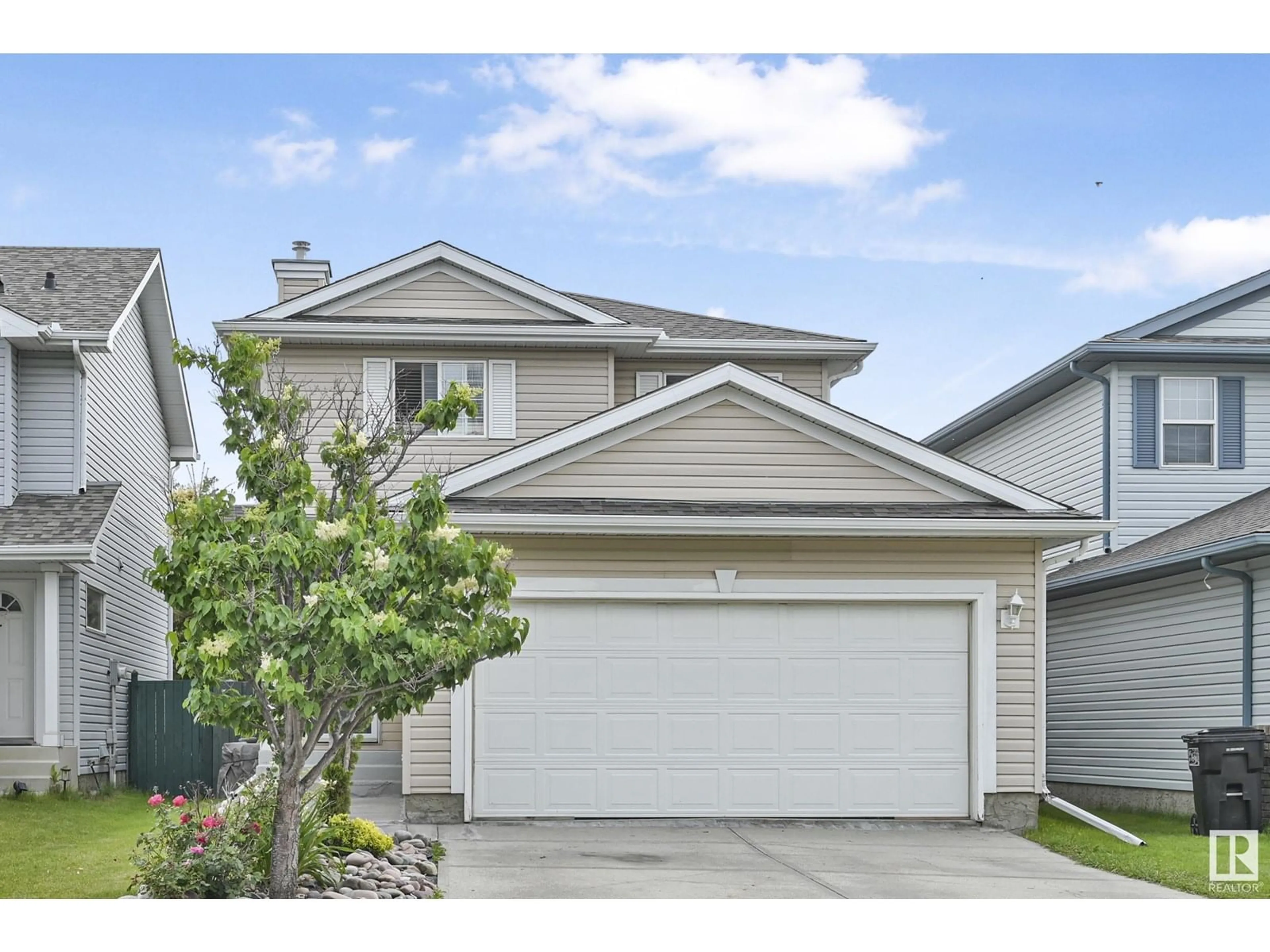 Home with vinyl exterior material, street for 1857 GARNETT WY, Edmonton Alberta T5T6R3