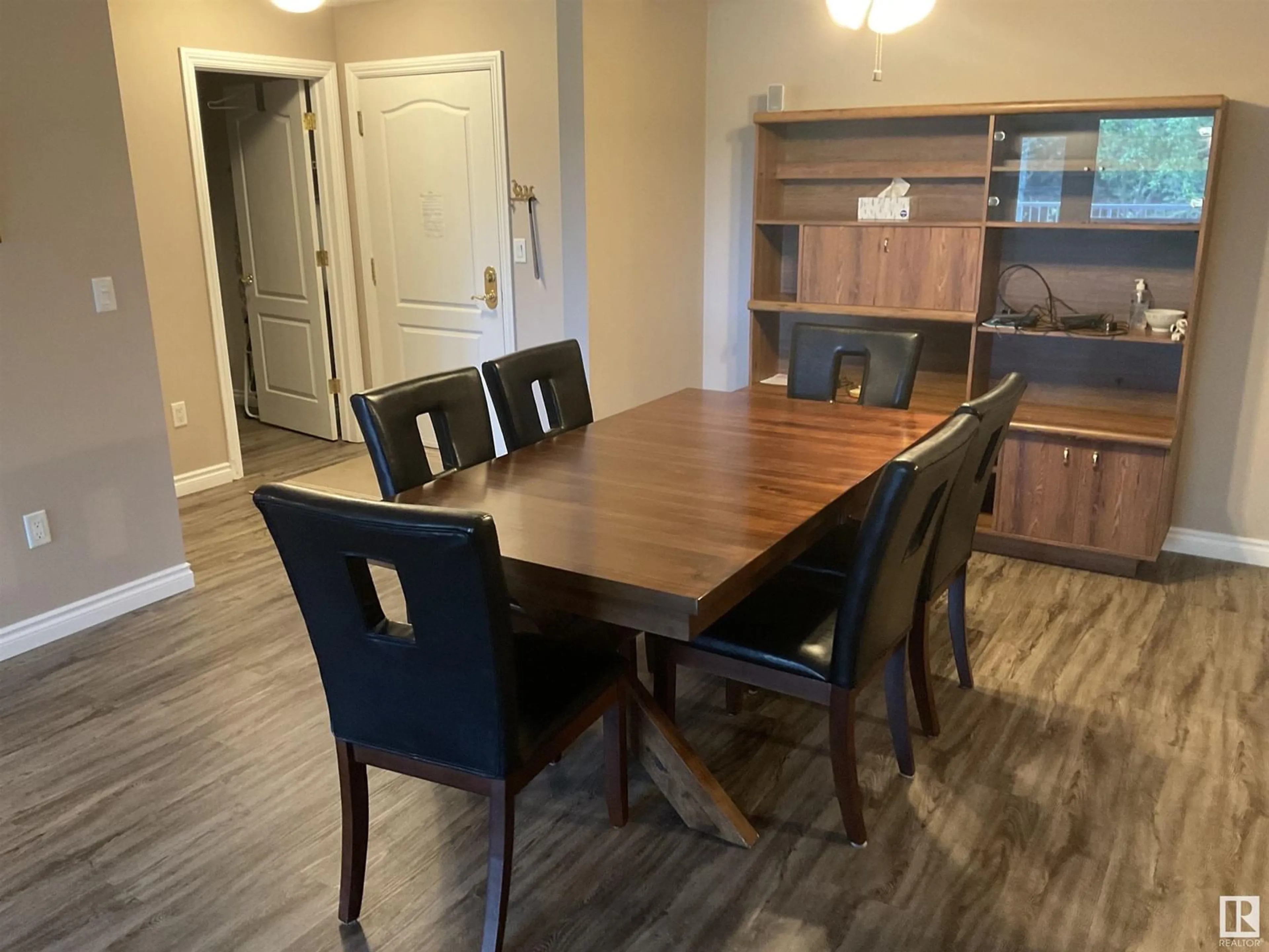 Dining room, wood/laminate floor for 6220 - 211 FULTON RD, Edmonton Alberta T6A3T4