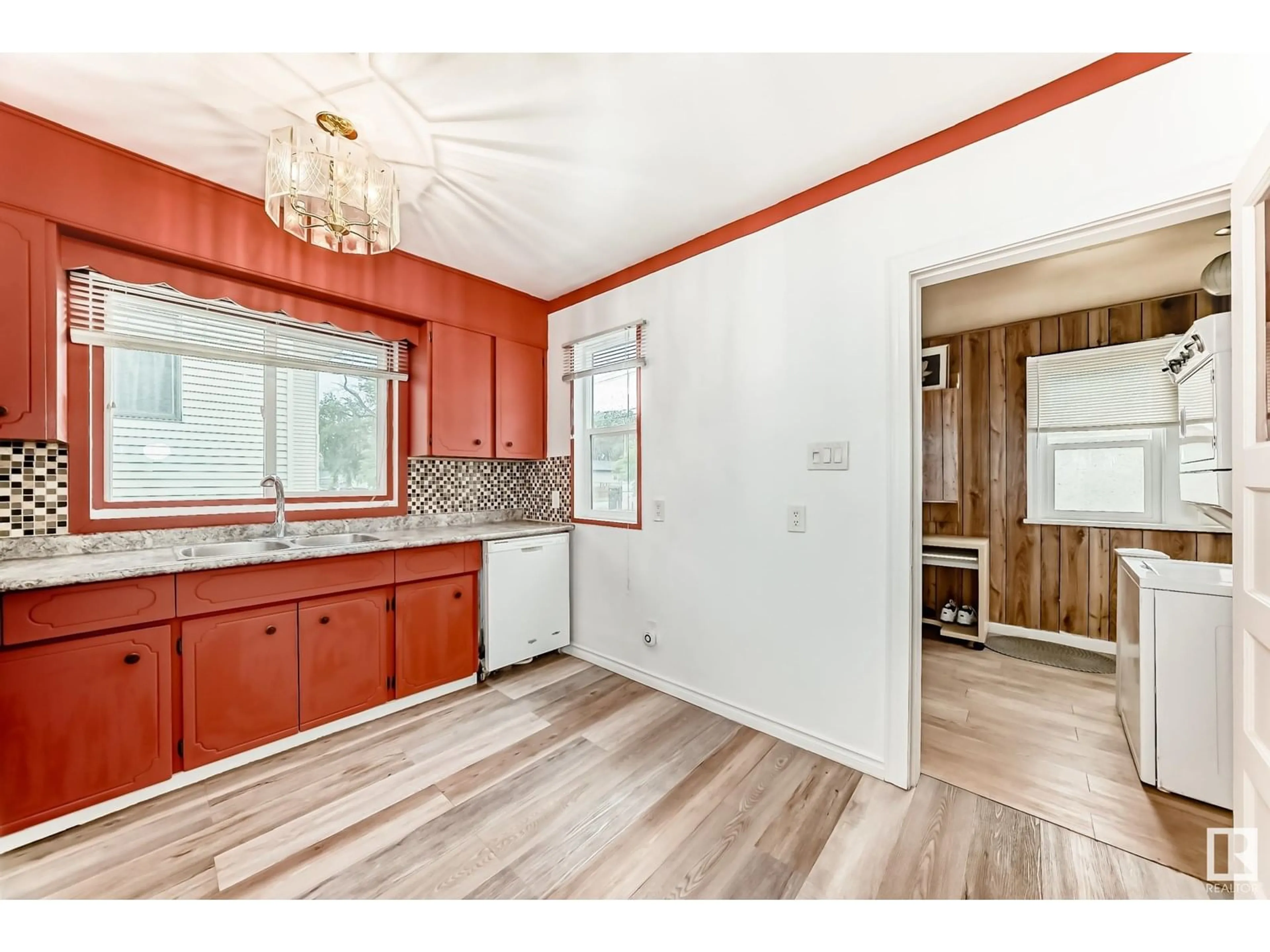 Open concept kitchen, wood/laminate floor for 12008 66 ST, Edmonton Alberta T5B1J6