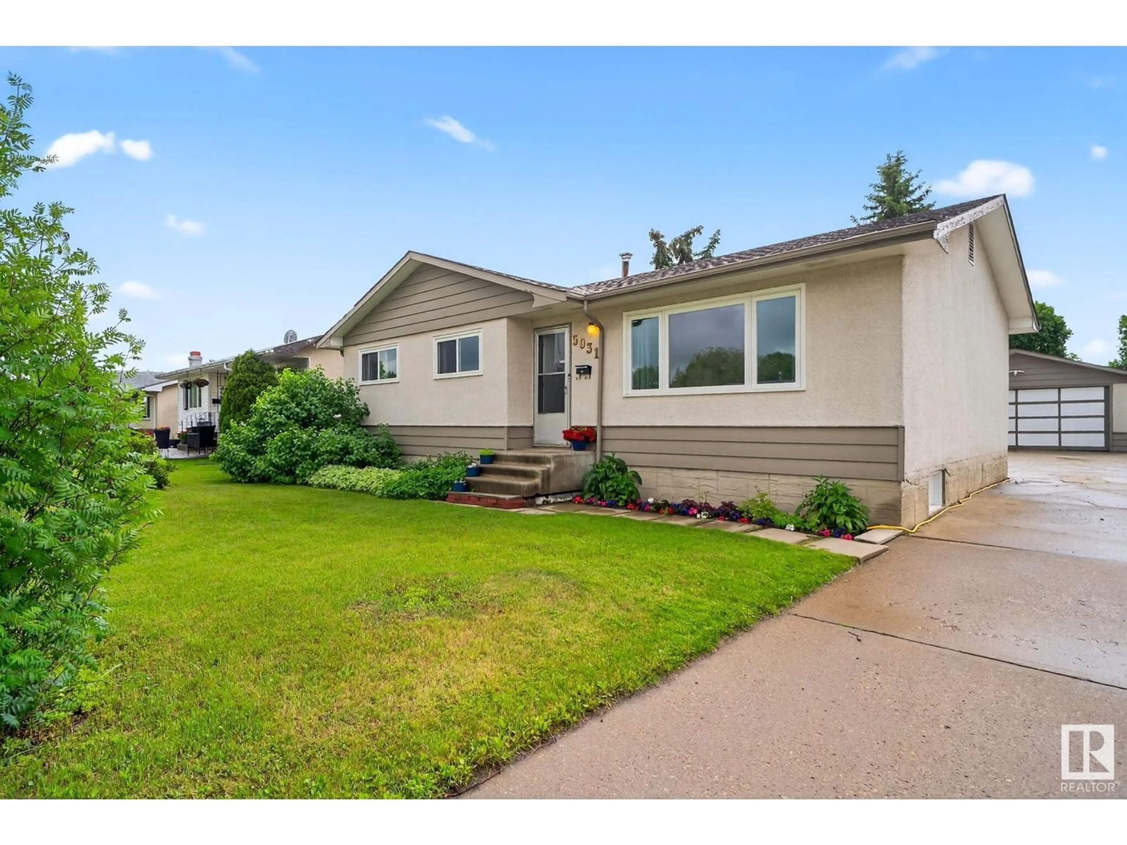 Home with vinyl exterior material, street for 5931 149 AV, Edmonton Alberta T5A1V7