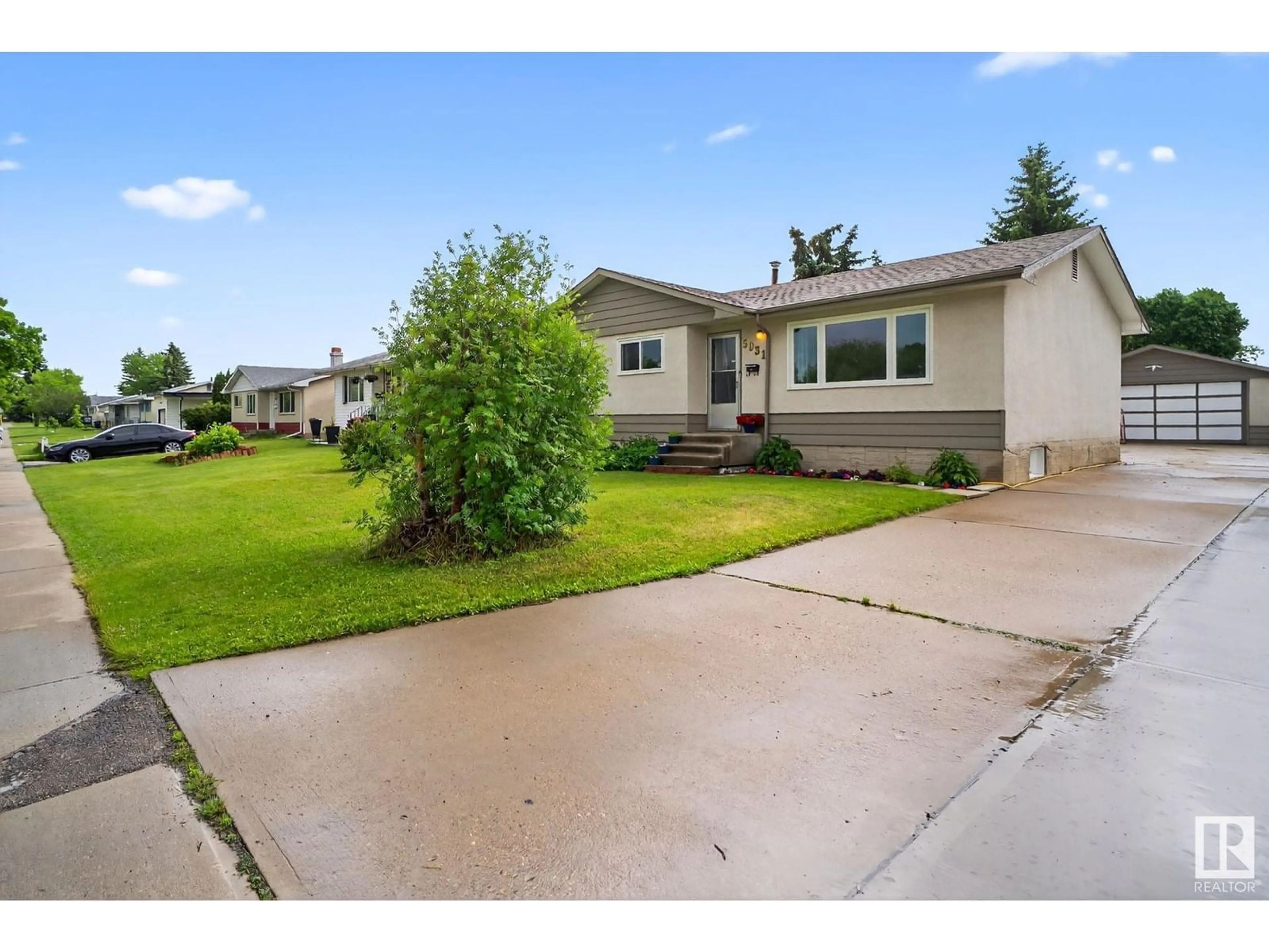 Home with vinyl exterior material, street for 5931 149 AV, Edmonton Alberta T5A1V7