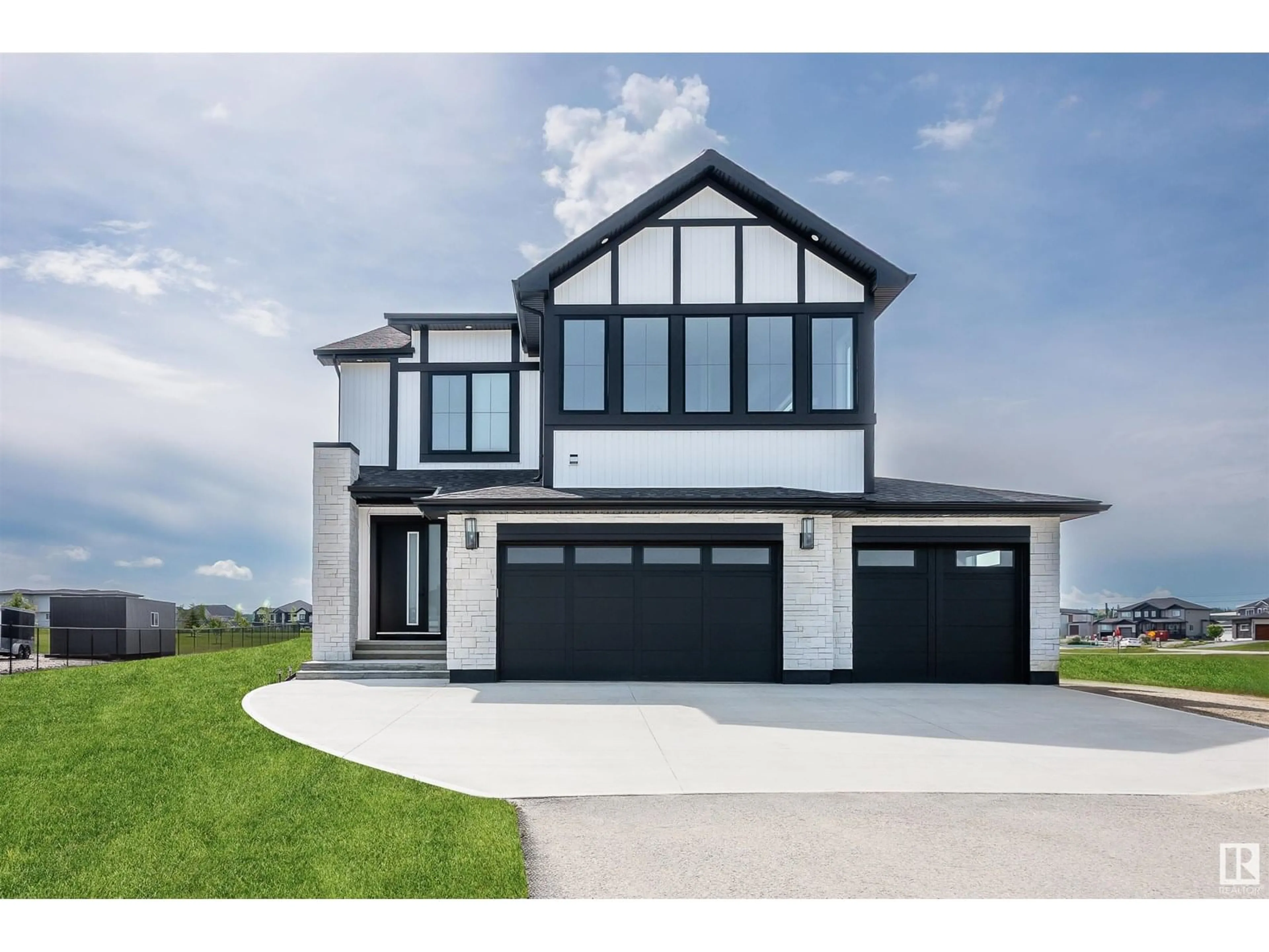 Home with vinyl exterior material, street for 43 26409 TWP RD 532 A, Rural Parkland County Alberta T7X0W7