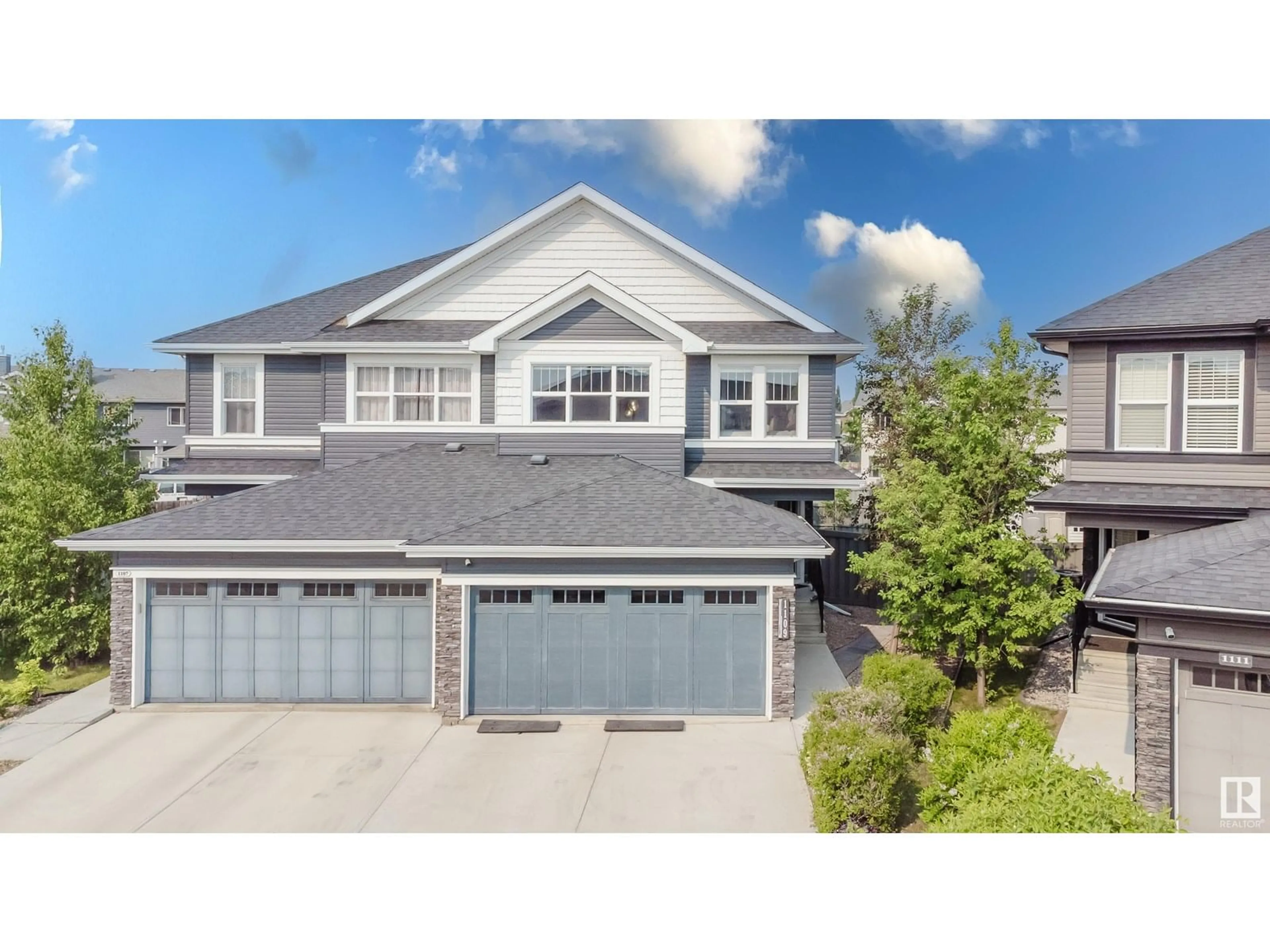 Home with vinyl exterior material, street for SW - 1109 176 ST, Edmonton Alberta T6W2B7
