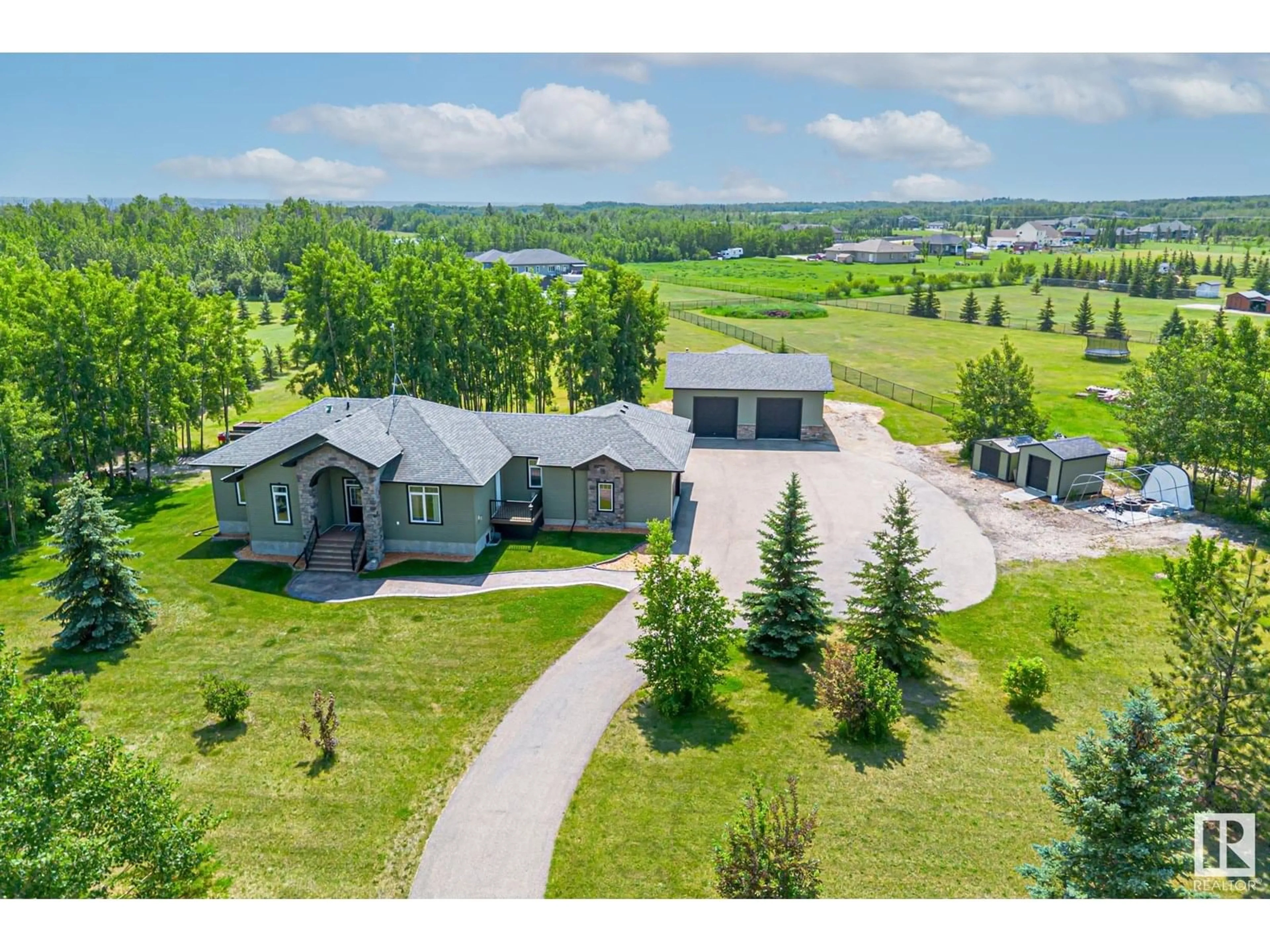 A pic from outside/outdoor area/front of a property/back of a property/a pic from drone, unknown for 53521 - 48 RGE ROAD 272, Rural Parkland County Alberta T7X3M5