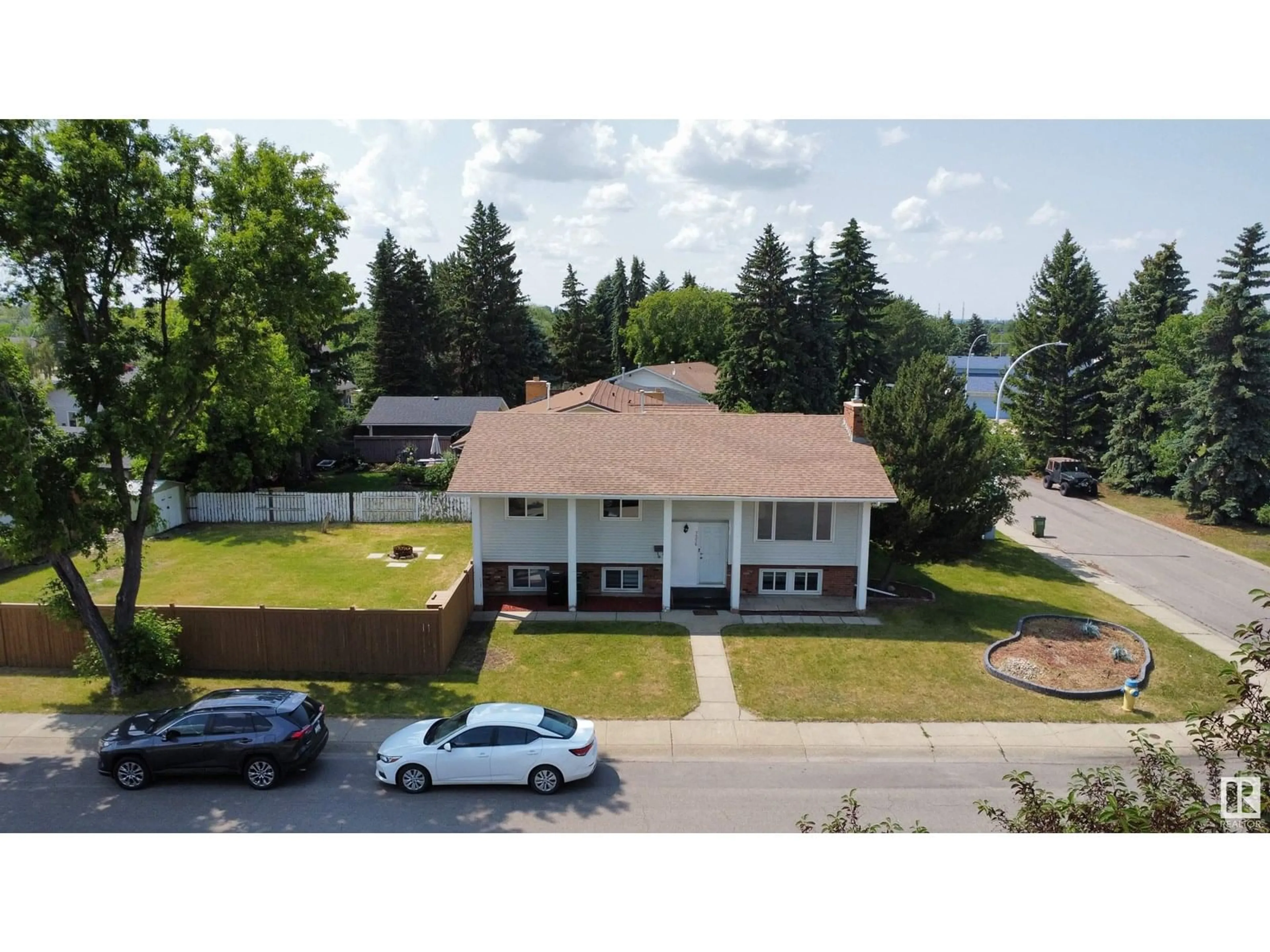 A pic from outside/outdoor area/front of a property/back of a property/a pic from drone, street for NW - 7336 21 AV, Edmonton Alberta T6K2C4