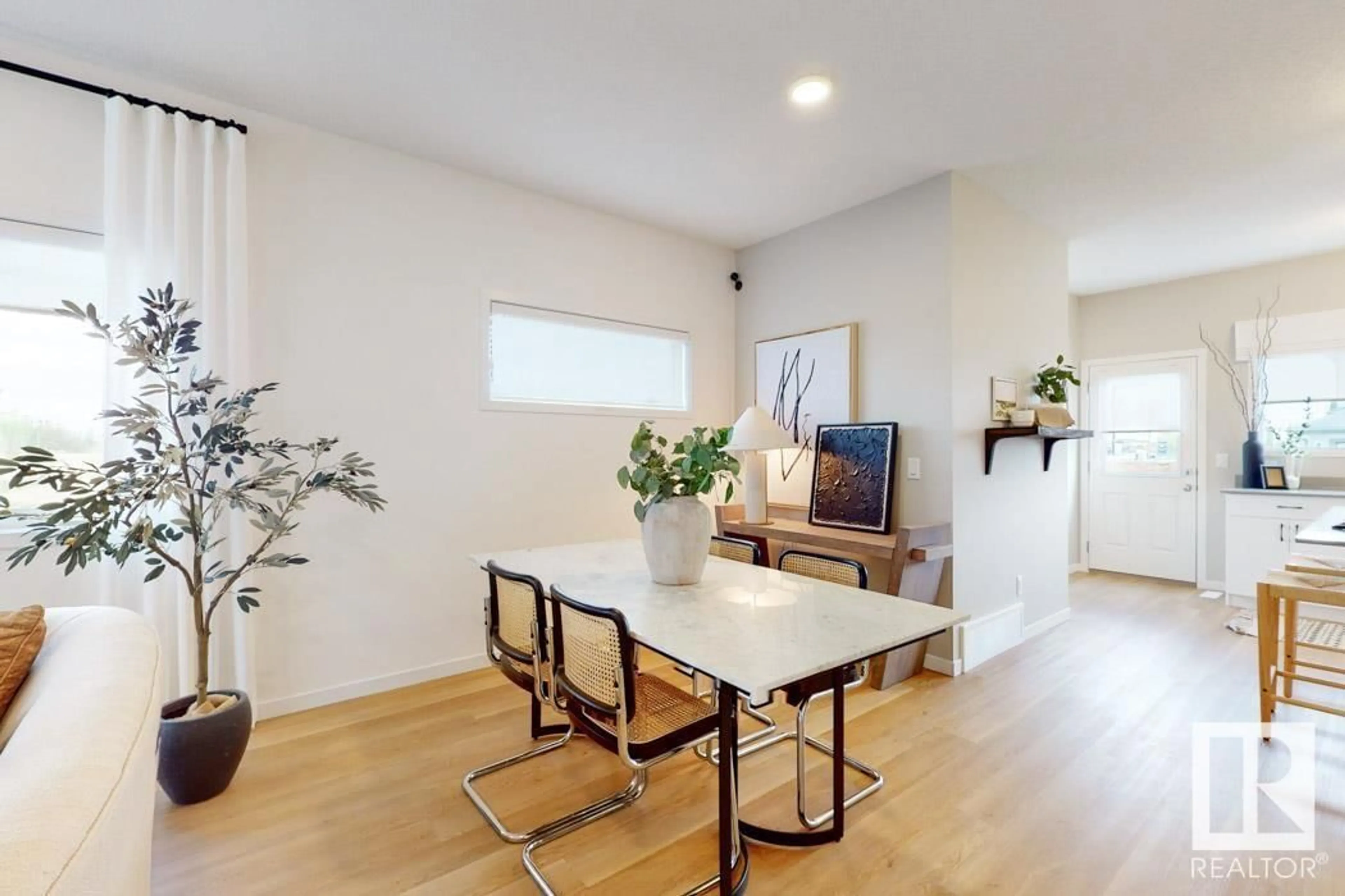Dining room, wood/laminate floor for 651 173 AVE, Edmonton Alberta T5Y4E8