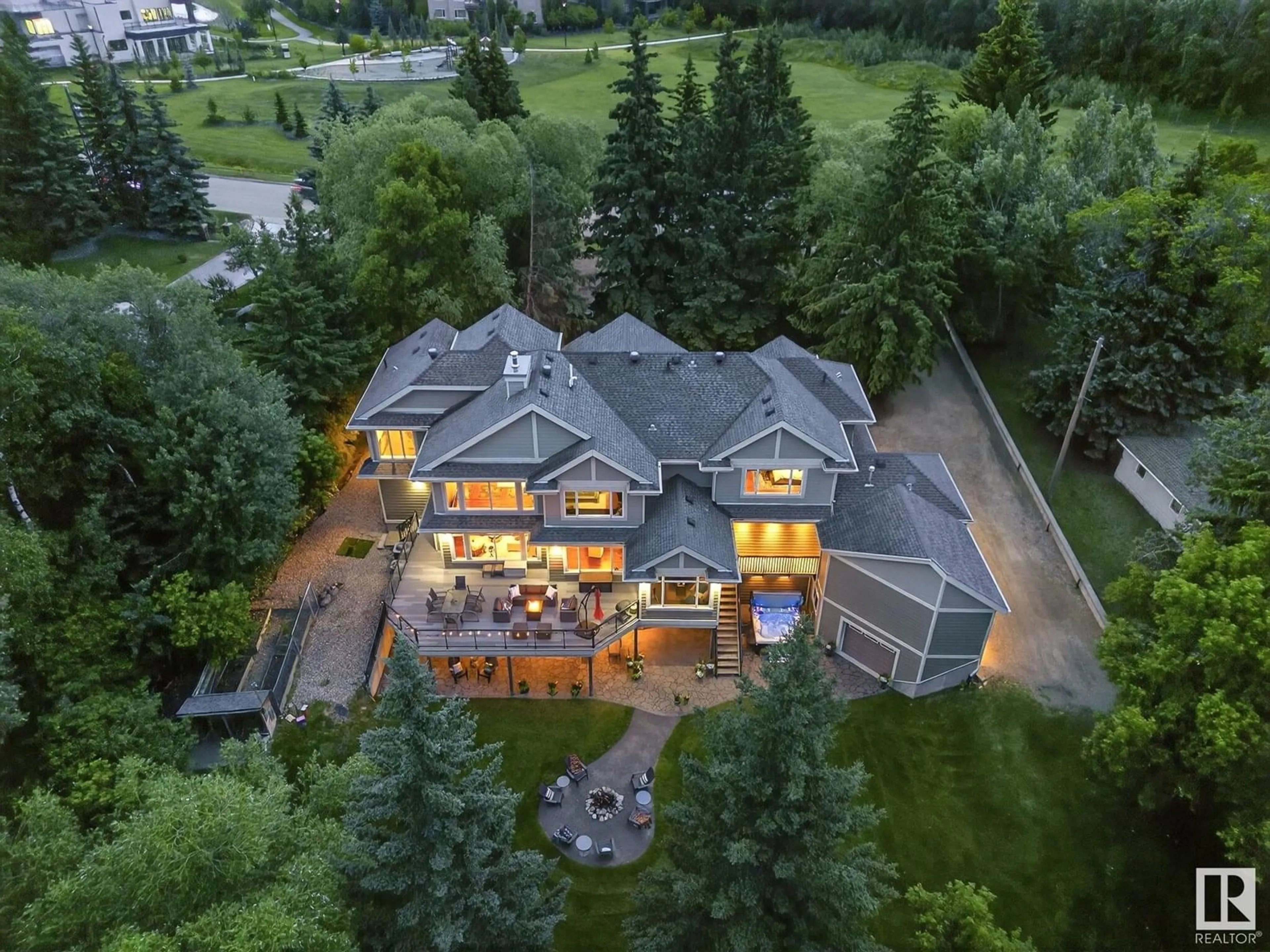 A pic from outside/outdoor area/front of a property/back of a property/a pic from drone, mountain view for 112 WINDERMERE DR, Edmonton Alberta T6W0S4