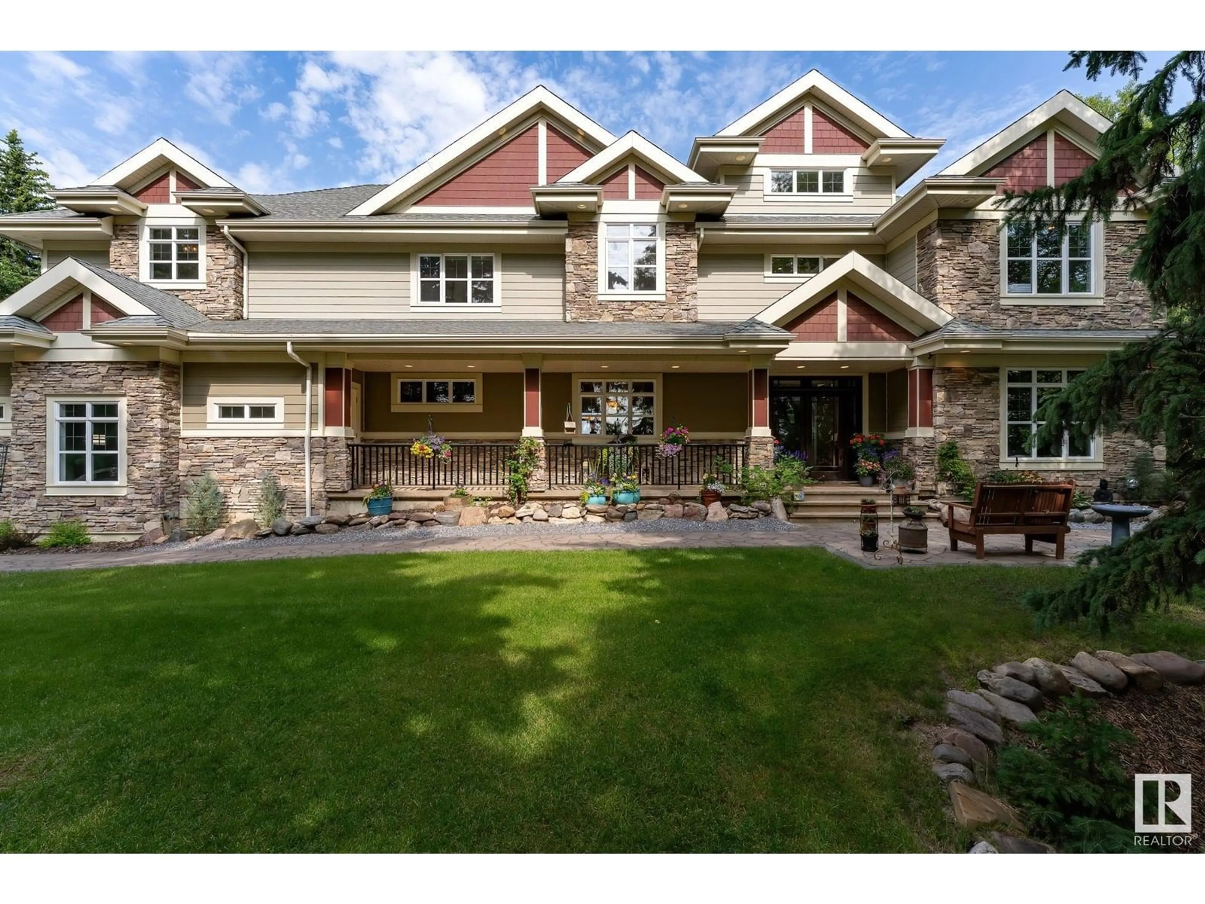 Home with brick exterior material, mountain view for 112 WINDERMERE DR, Edmonton Alberta T6W0S4