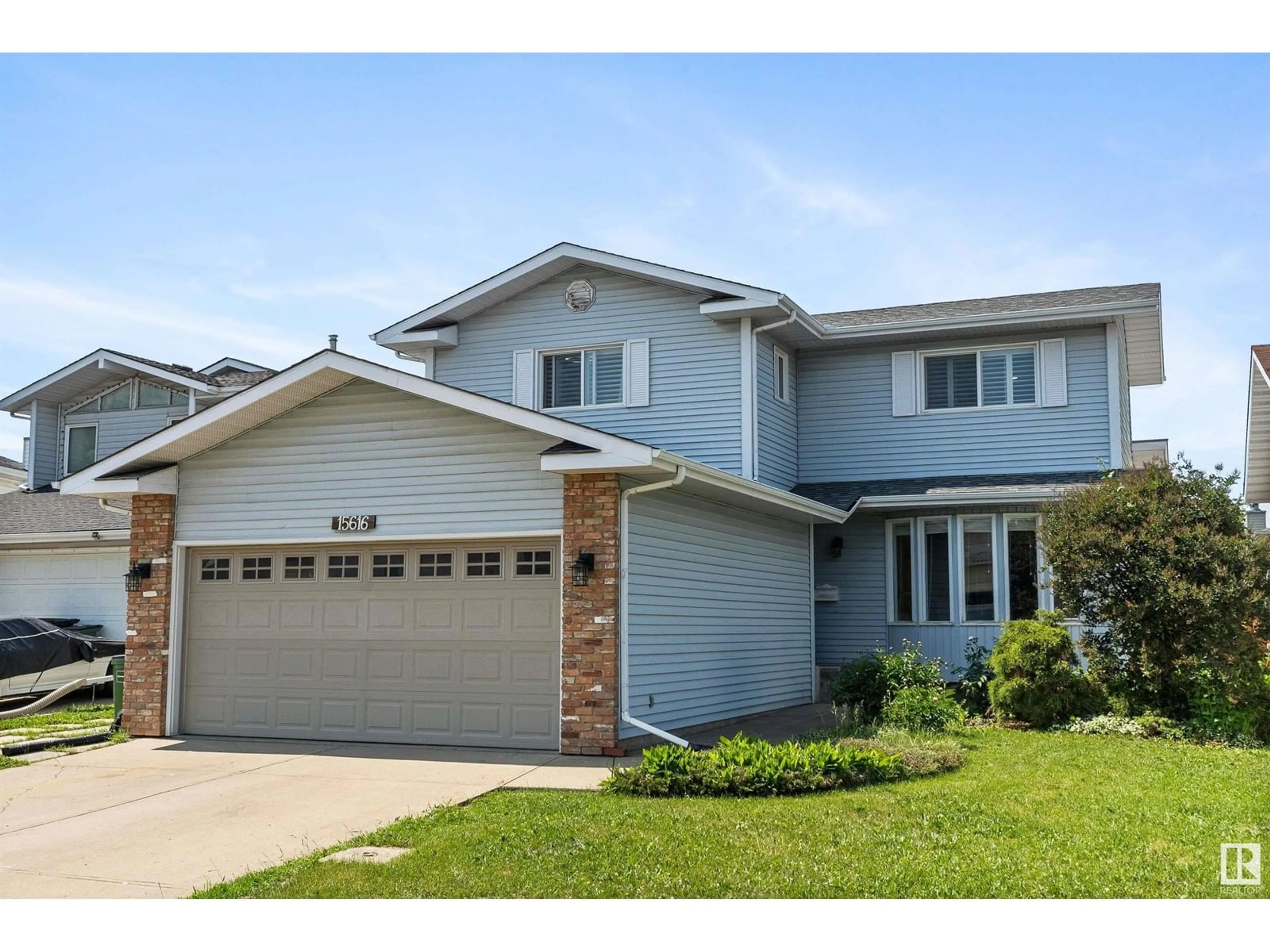 Home with vinyl exterior material, street for 15616 80 ST, Edmonton Alberta T5S2T5