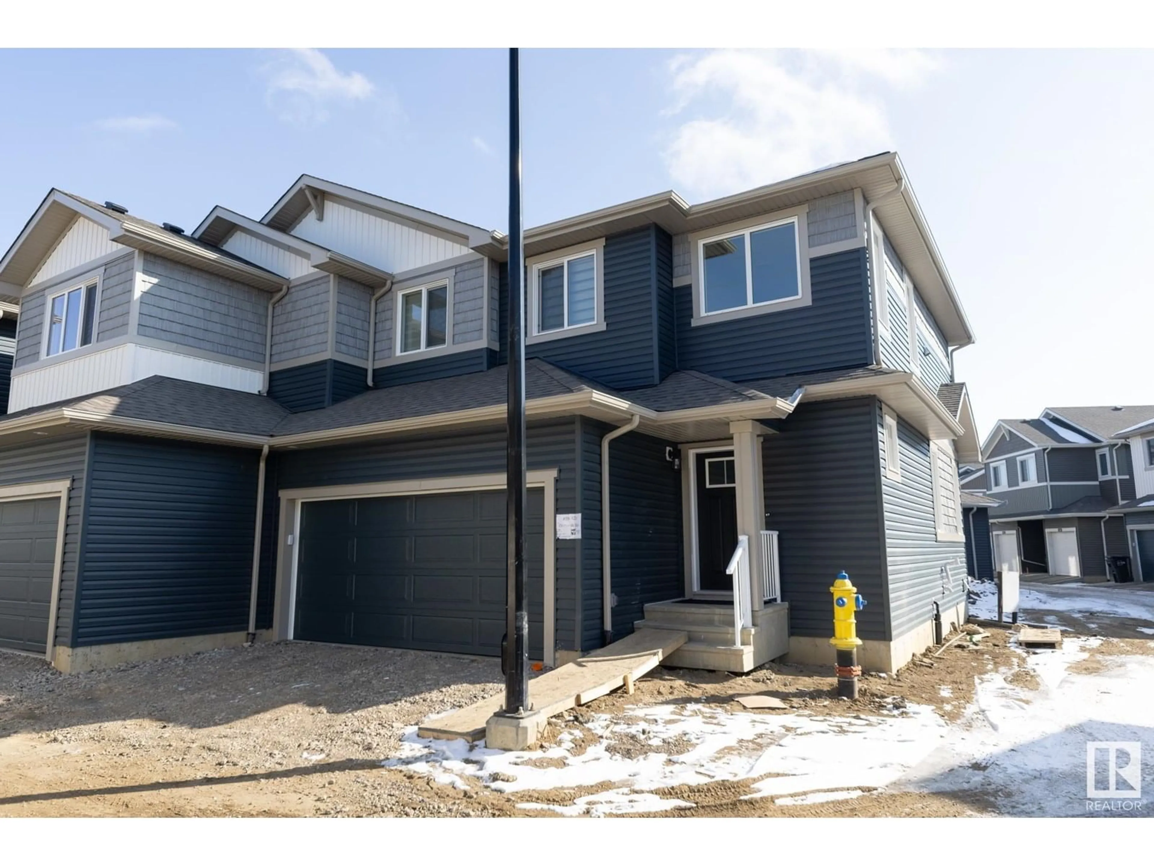 Home with vinyl exterior material, street for 603 - 39 ORCHARDS BV, Edmonton Alberta T6X2W8