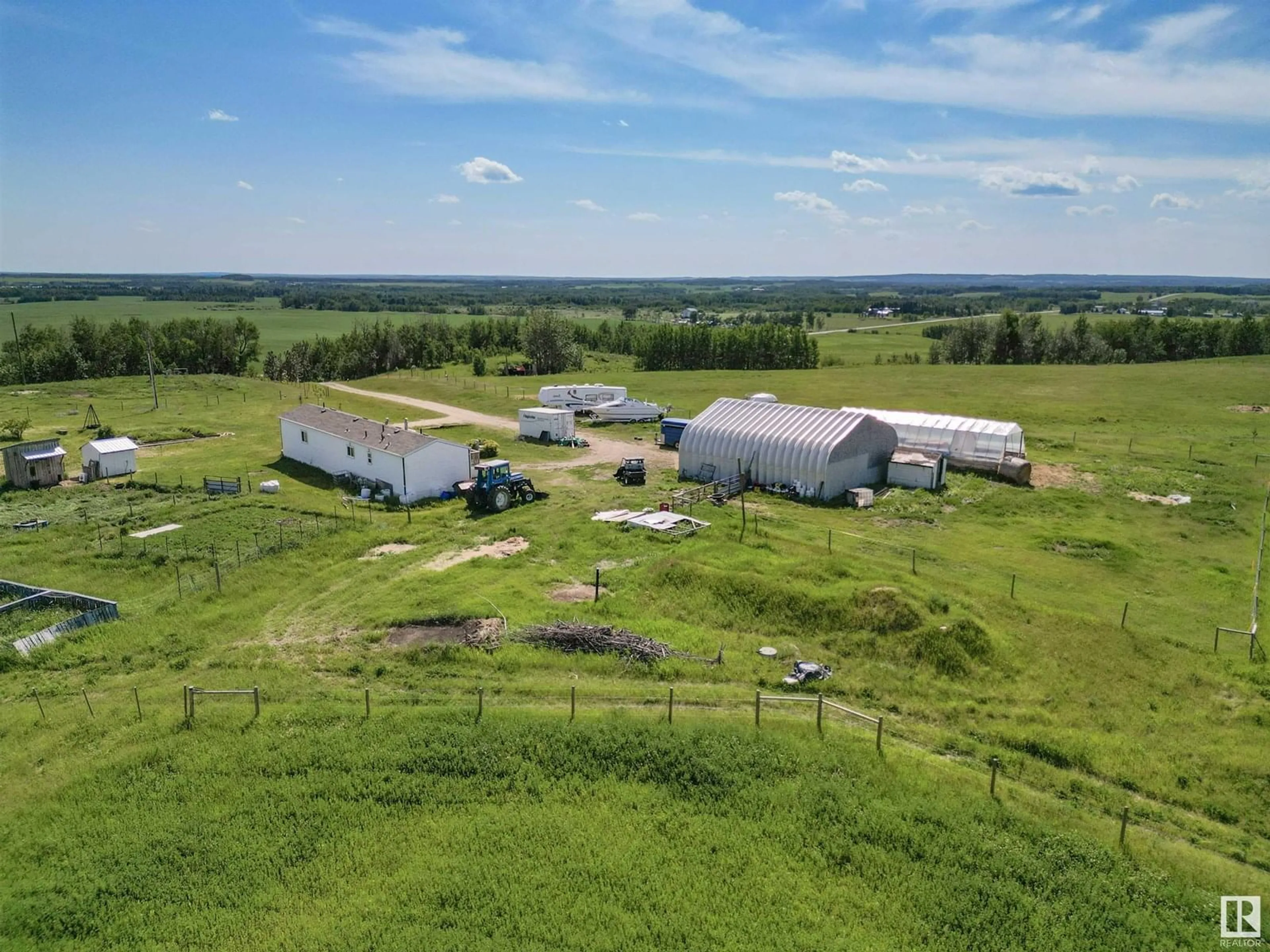 A pic from outside/outdoor area/front of a property/back of a property/a pic from drone, building for 6114 TWP ROAD 514, Rural Parkland County Alberta T0E2H0