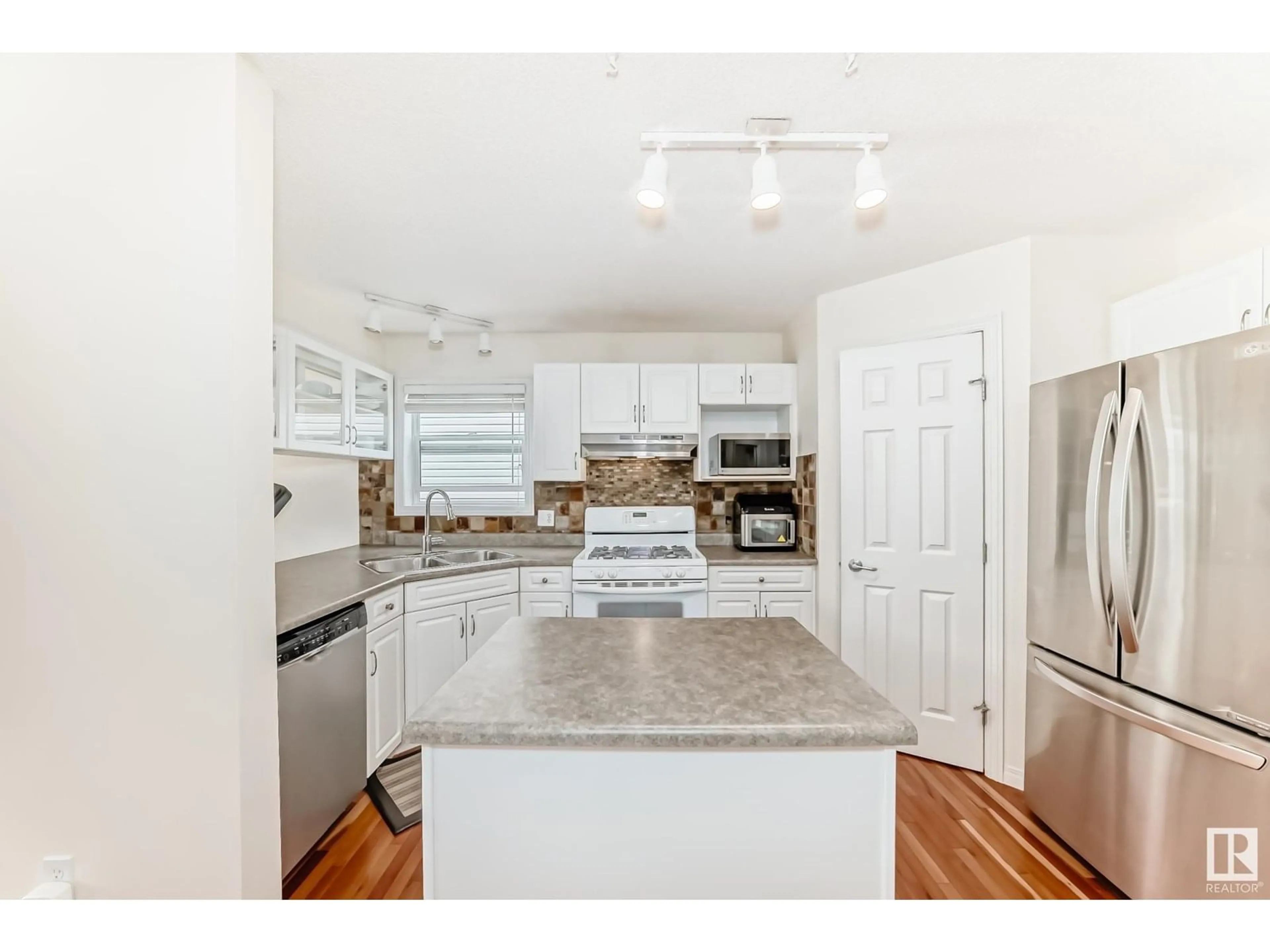 Open concept kitchen, unknown for 1509 ROBERTSON WAY, Edmonton Alberta T6W1H4