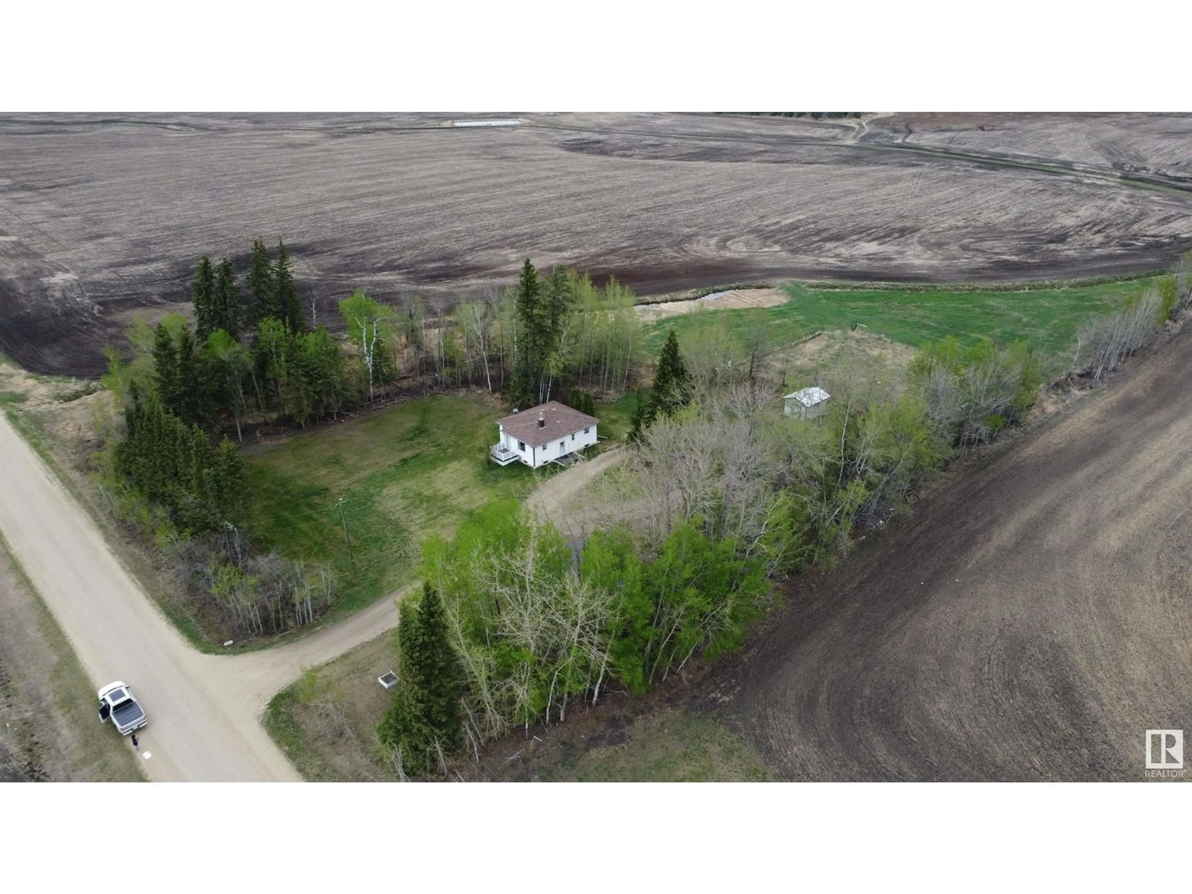 A pic from outside/outdoor area/front of a property/back of a property/a pic from drone, unknown for 59117 RG RD 11, Rural Westlock County Alberta T7P2N9