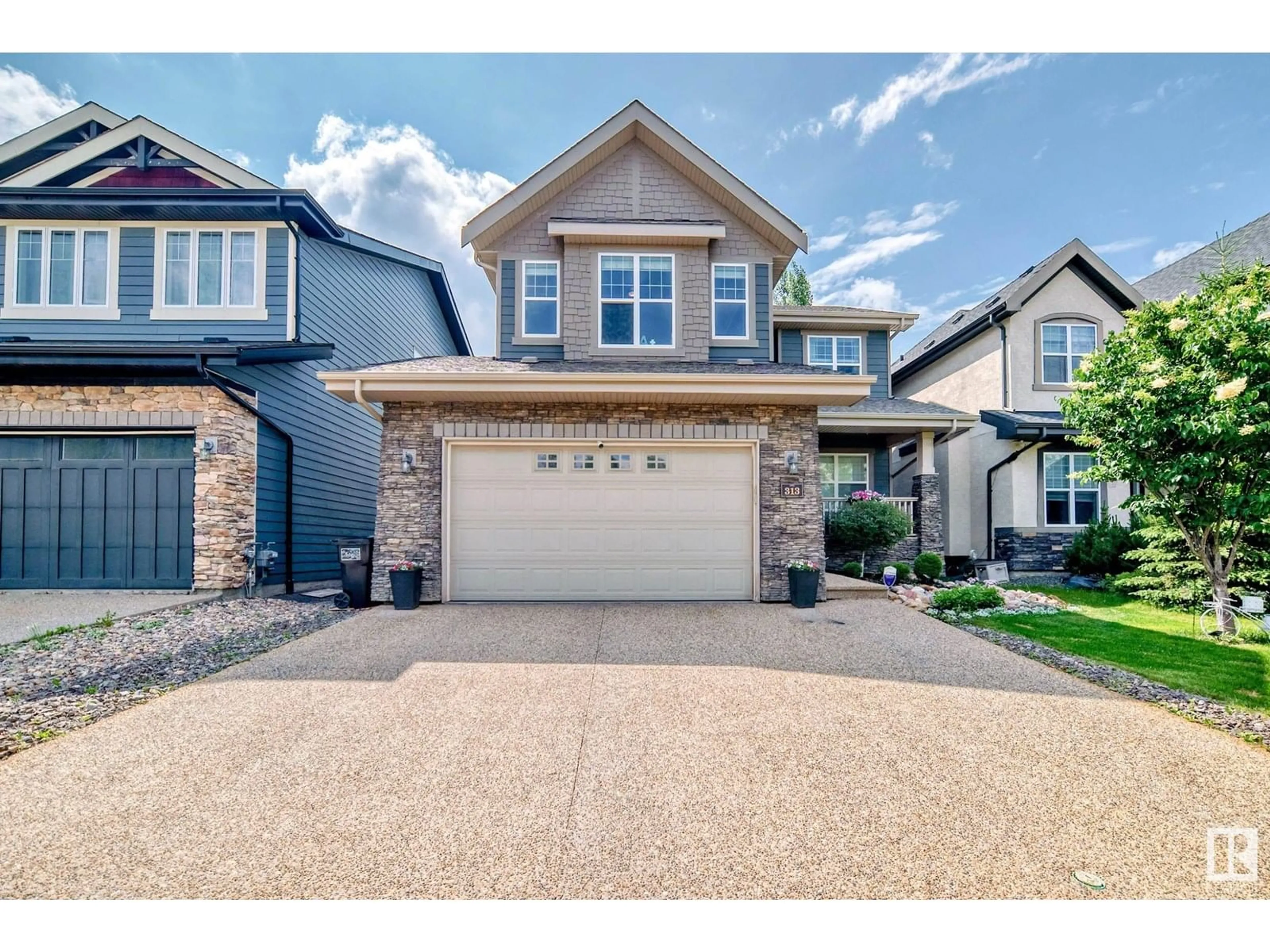 Home with vinyl exterior material, street for 313 MAGRATH BV, Edmonton Alberta T6R3T7