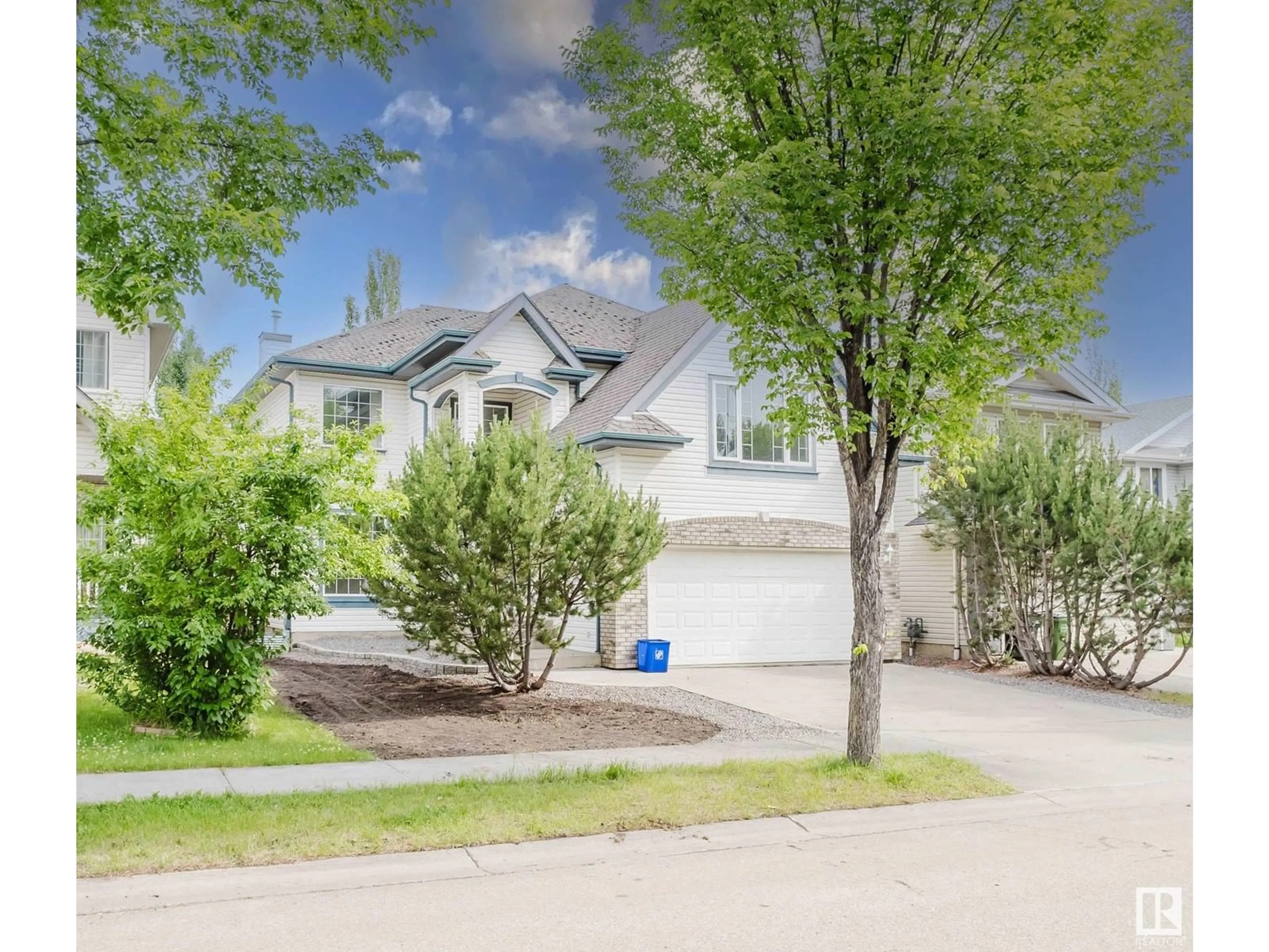 Home with vinyl exterior material, street for 408 HODGSON BV, Edmonton Alberta T6R3G4