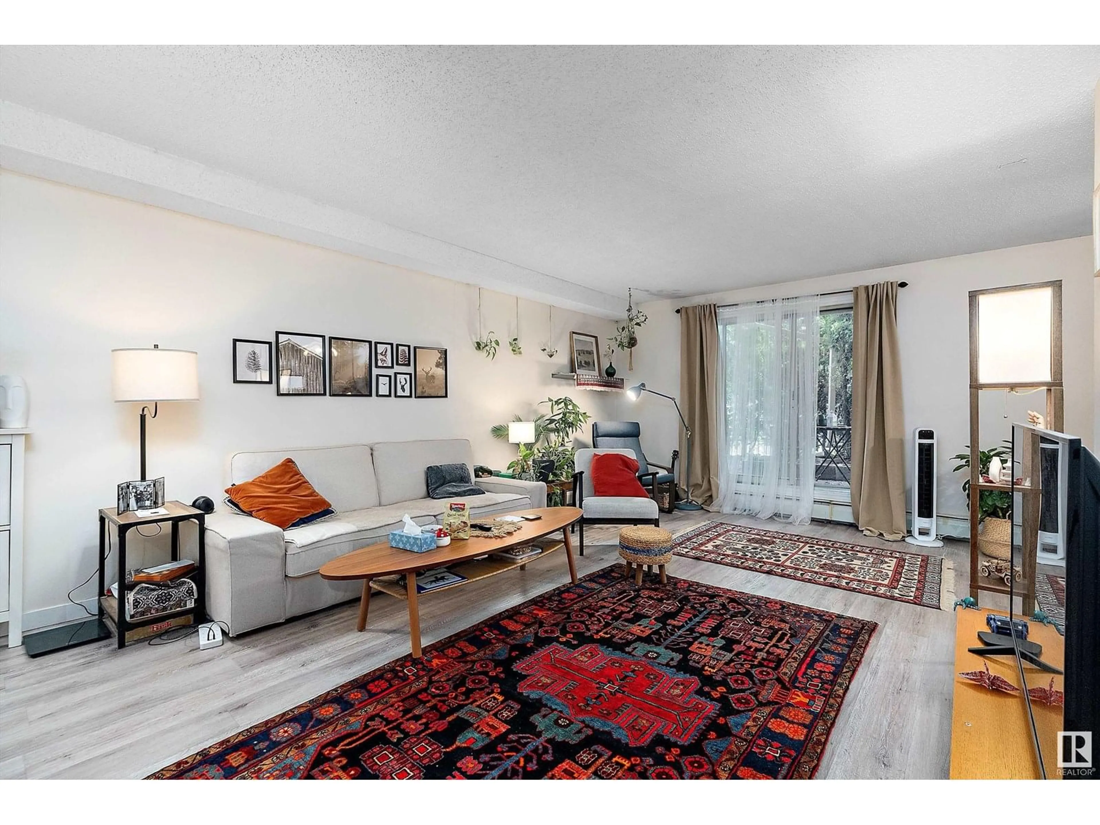 Living room with furniture, unknown for #101 - 10732 86 AV, Edmonton Alberta T6E2M9