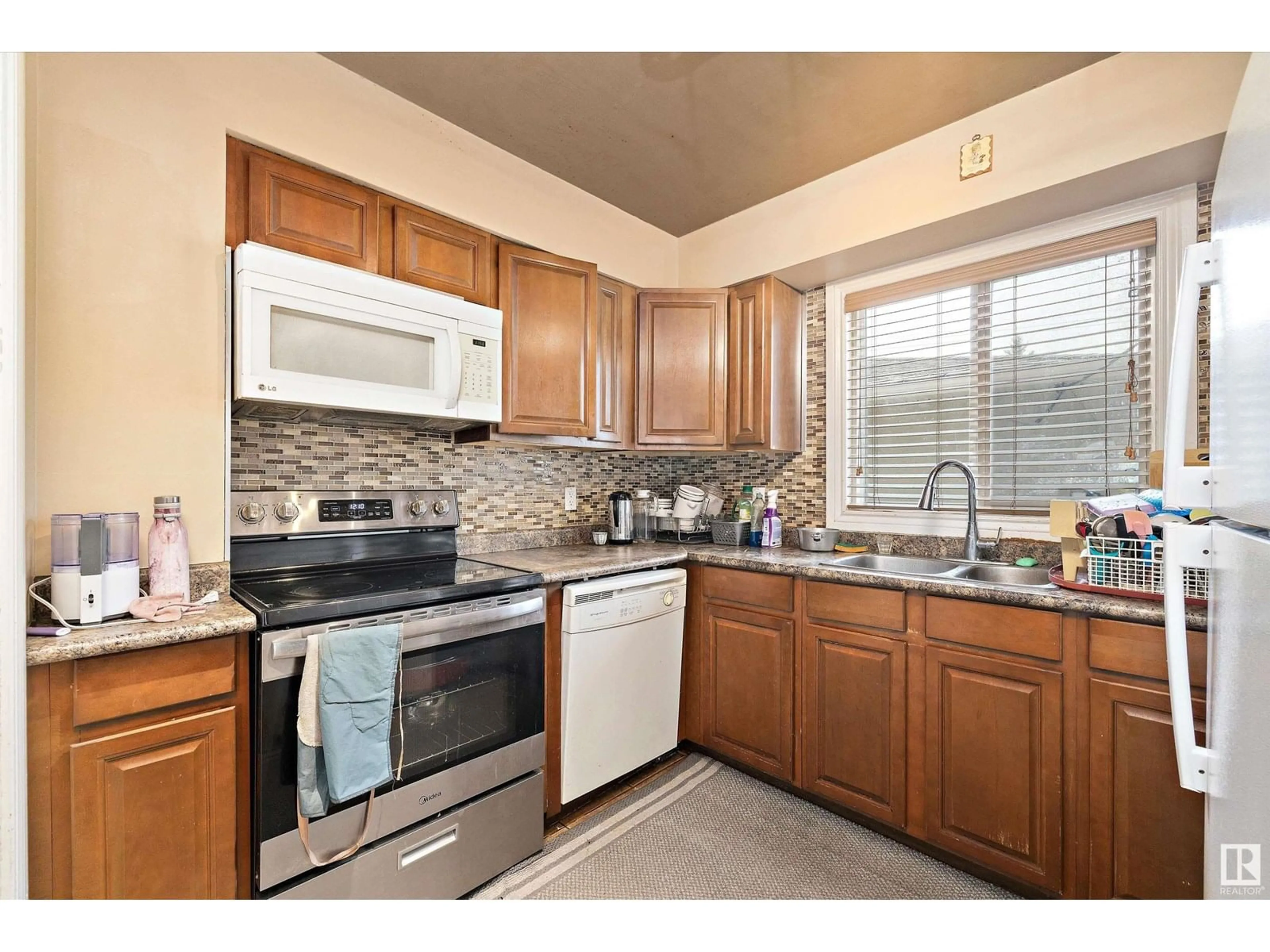 Standard kitchen, ceramic/tile floor for 12411 132 AV, Edmonton Alberta T5L3P8