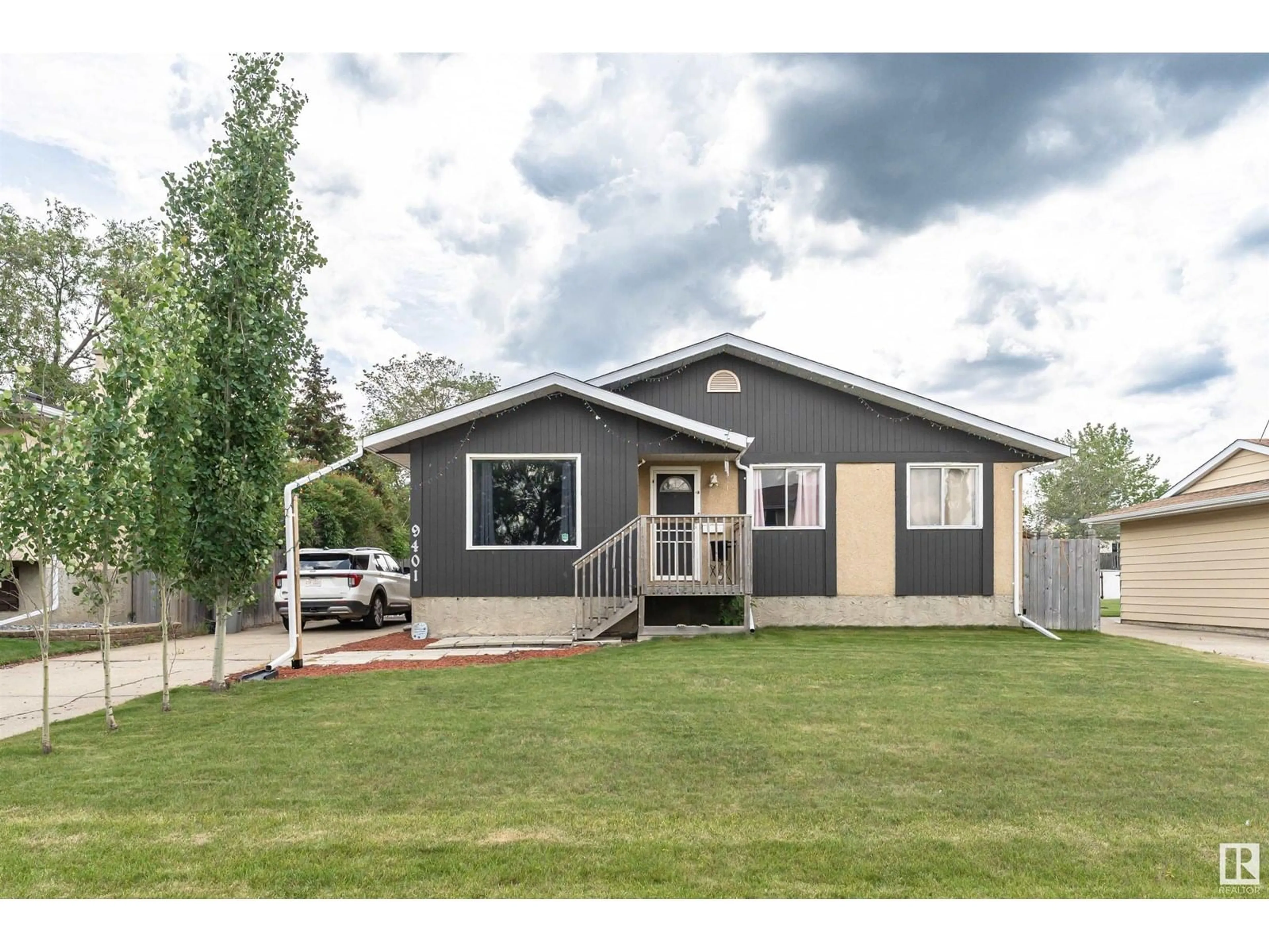 Home with vinyl exterior material, street for 9401 97 AV, Morinville Alberta T8R1J3