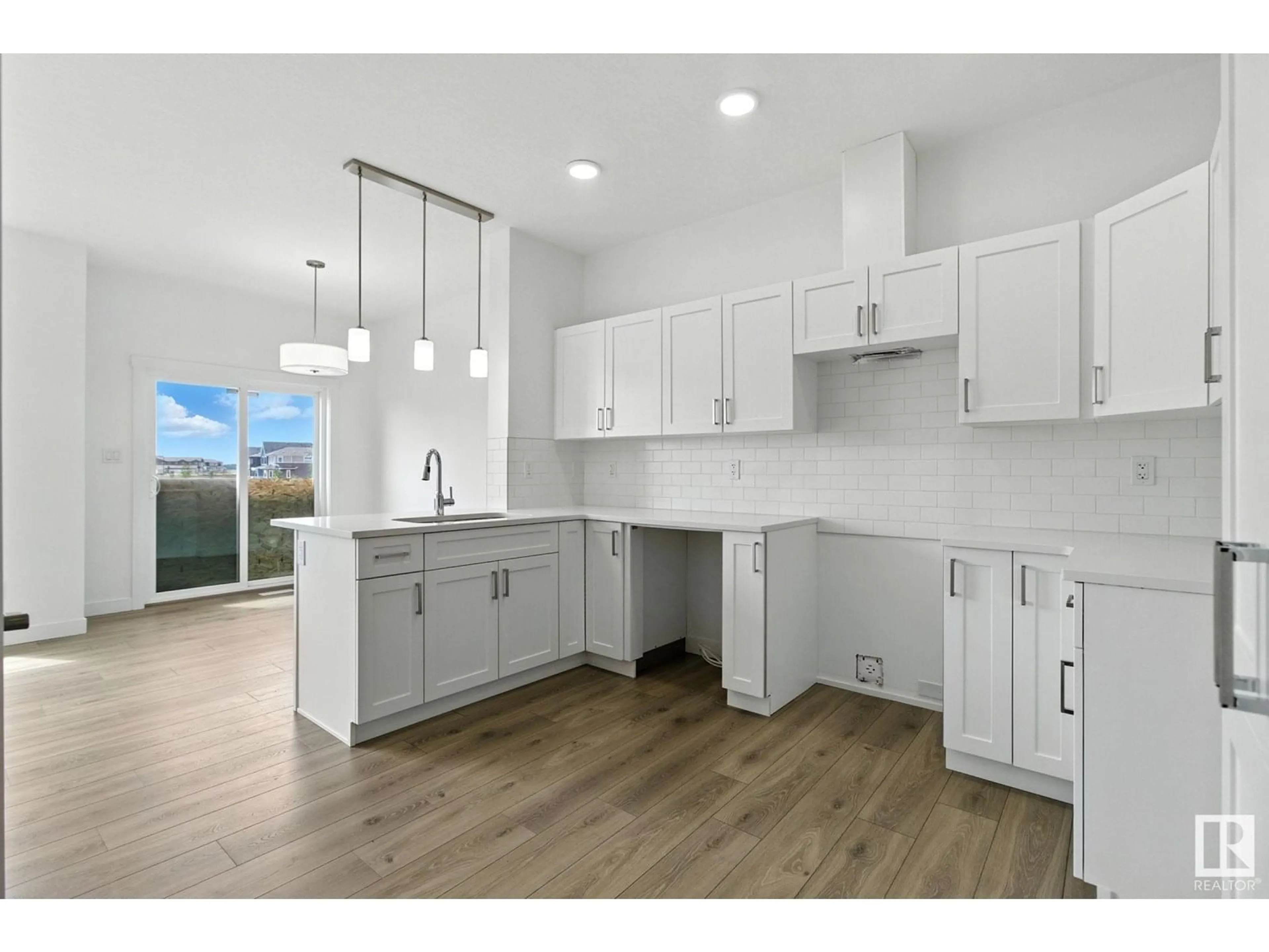 Open concept kitchen, unknown for 19 - 2710 66 ST, Edmonton Alberta T6Y4C3