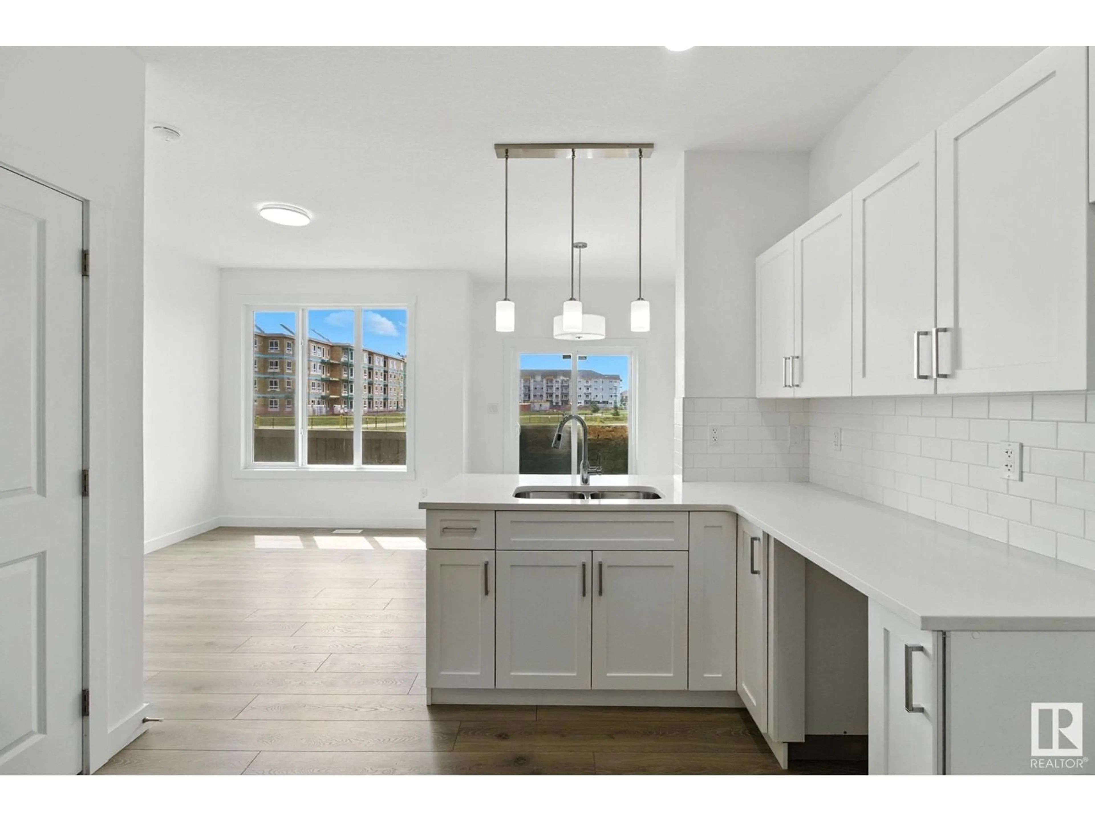 Open concept kitchen, unknown for 19 - 2710 66 ST, Edmonton Alberta T6Y4C3