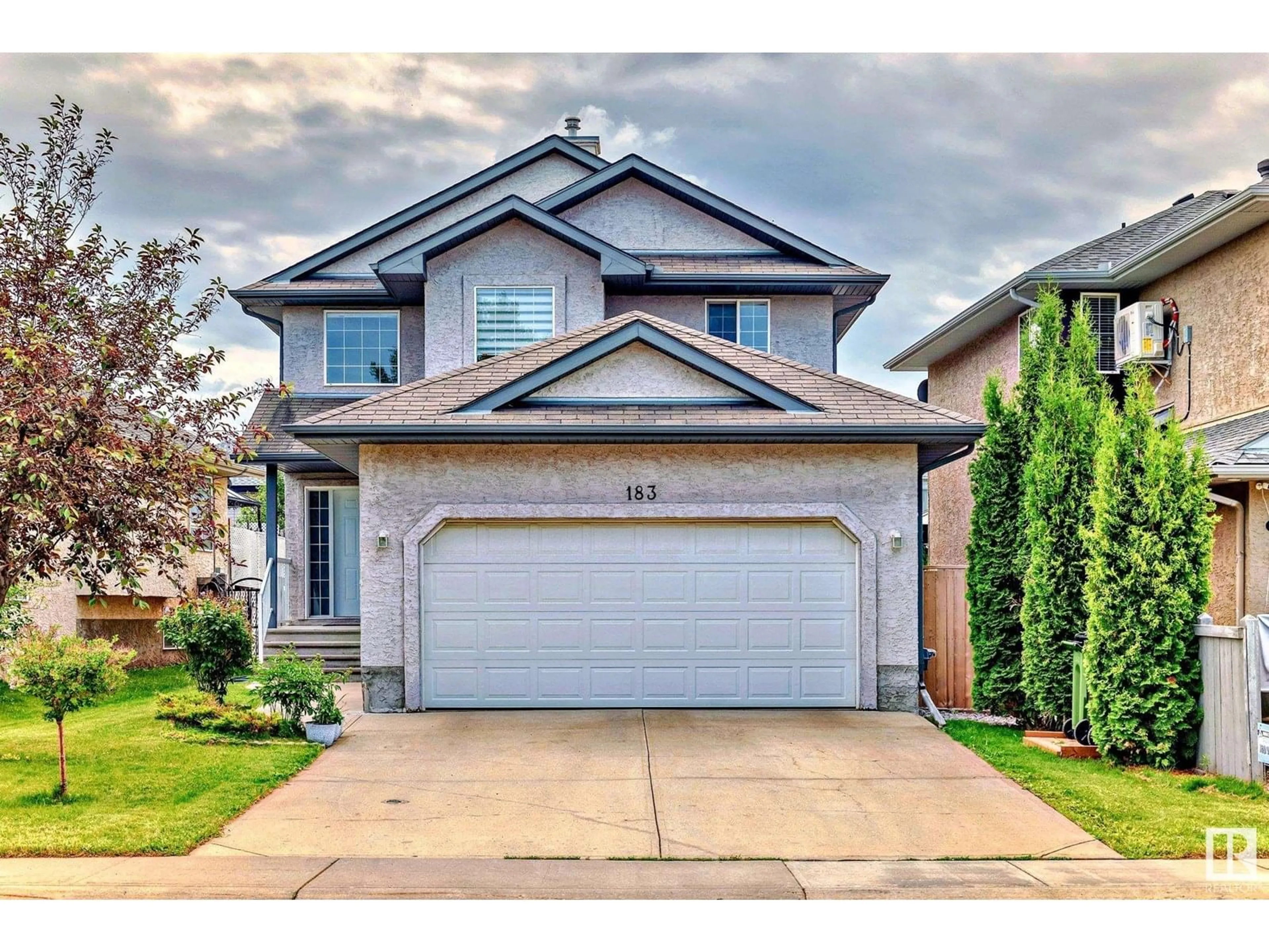 Home with vinyl exterior material, street for 183 CASTLE DR, Edmonton Alberta T5X6G4