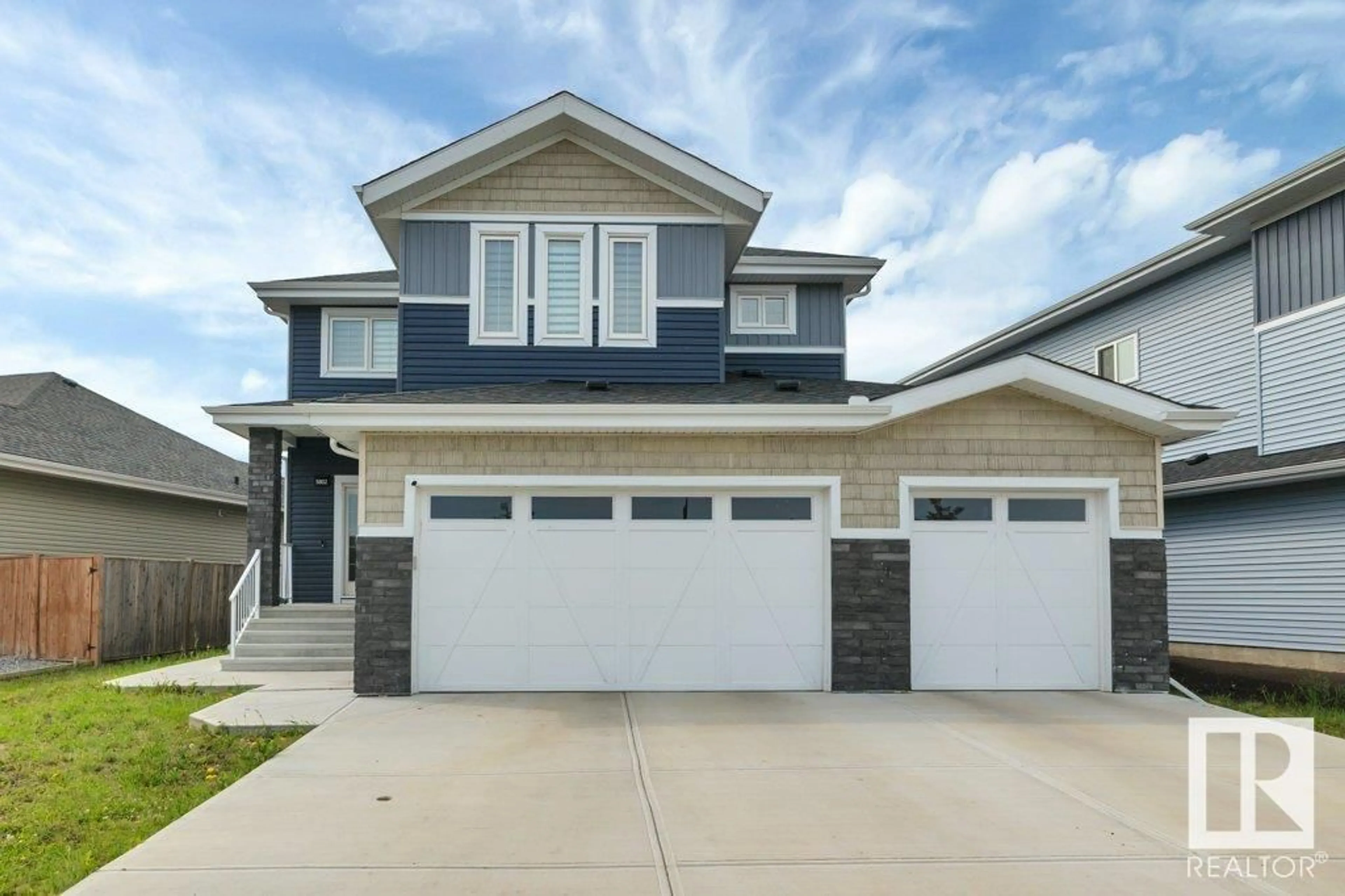 Home with vinyl exterior material, street for 5802 SOLEIL BV, Beaumont Alberta T4X2X9