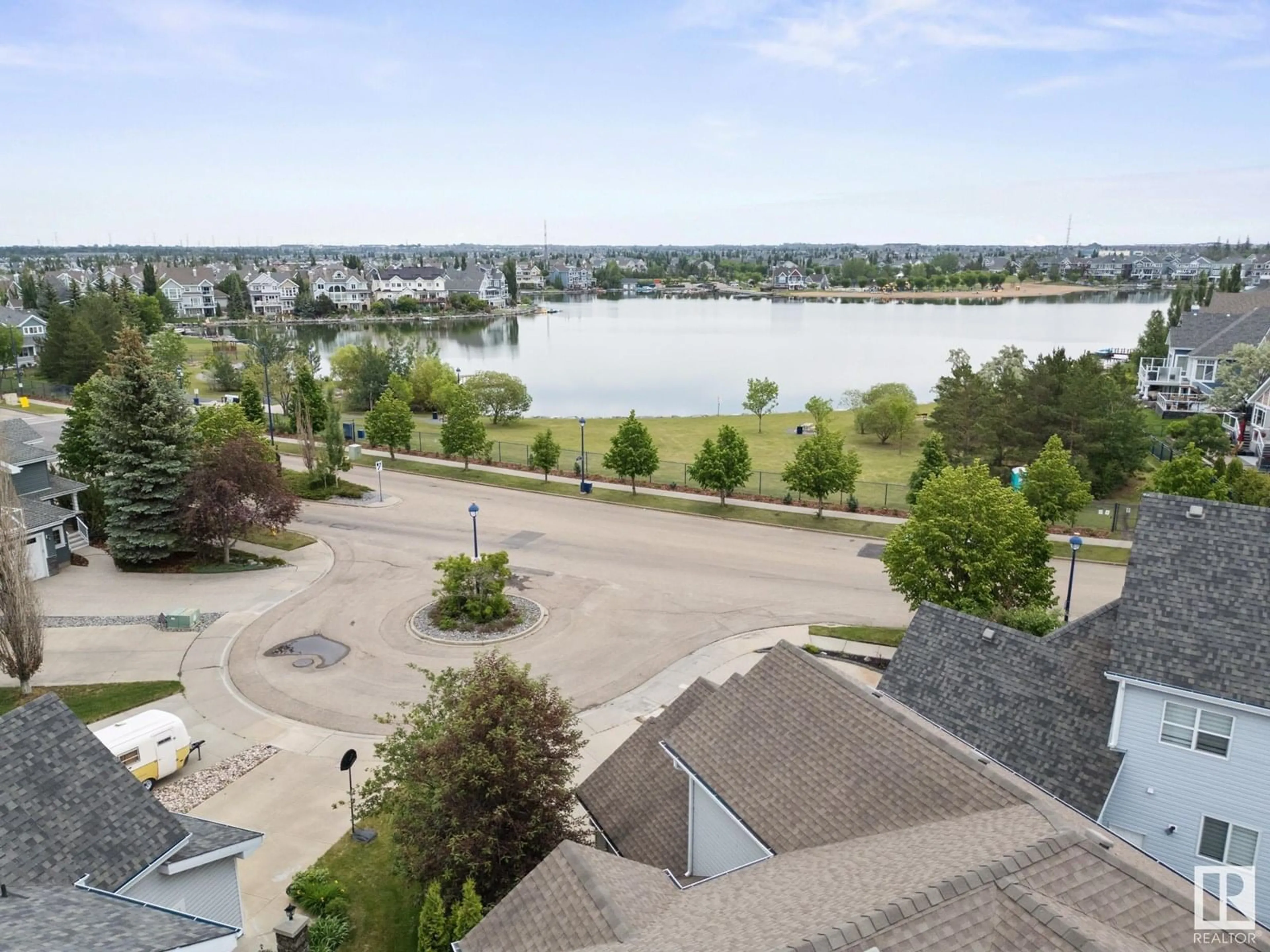 A pic from outside/outdoor area/front of a property/back of a property/a pic from drone, water/lake/river/ocean view for LI SW - 912 SUMMERSIDE LINK, Edmonton Alberta T6X1B2
